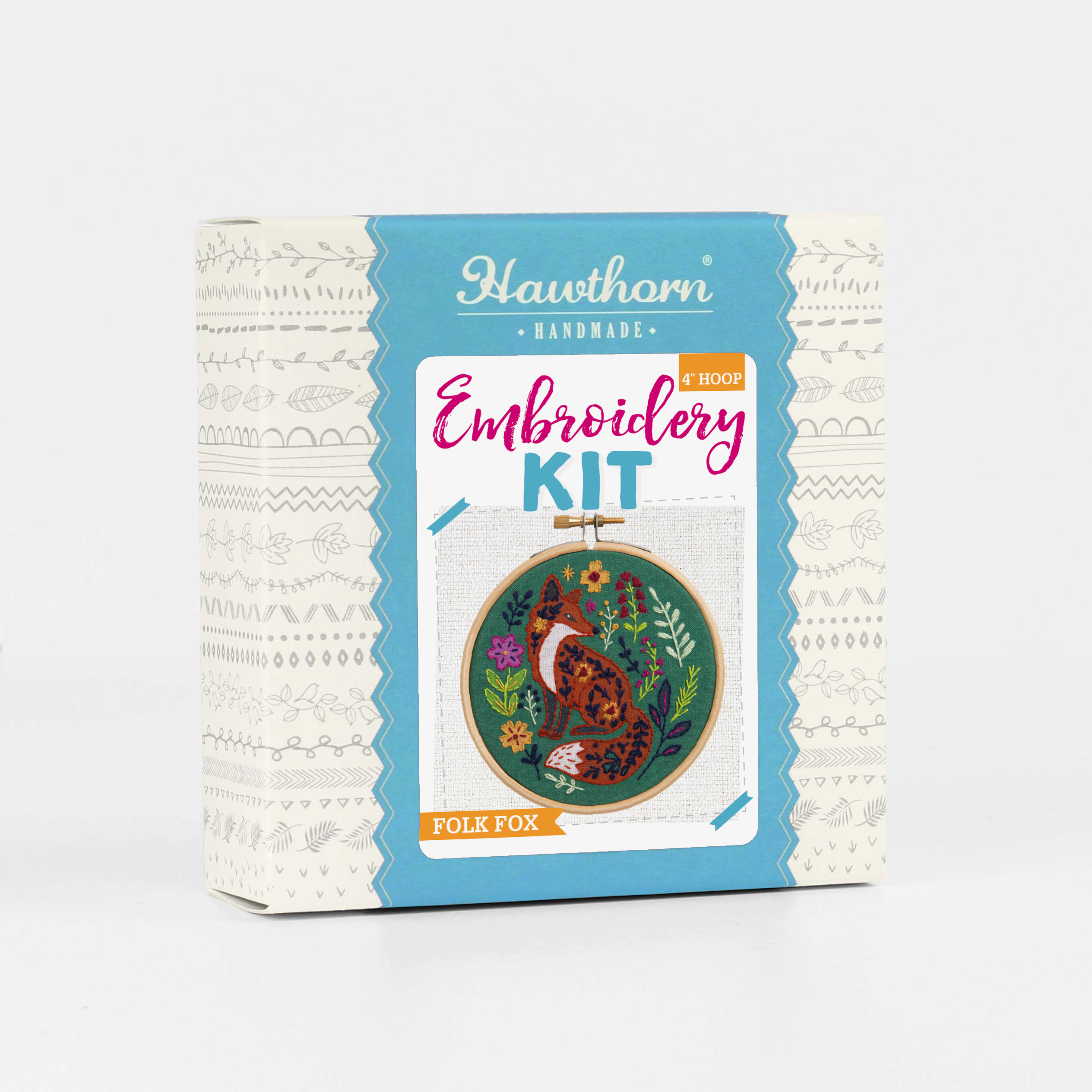Embroidery kit packaging with fox design on a white background.