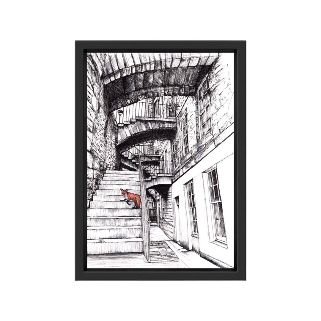 A framed illustrated print of a fox on a set of steps going down to one of Edinburgh's many basements