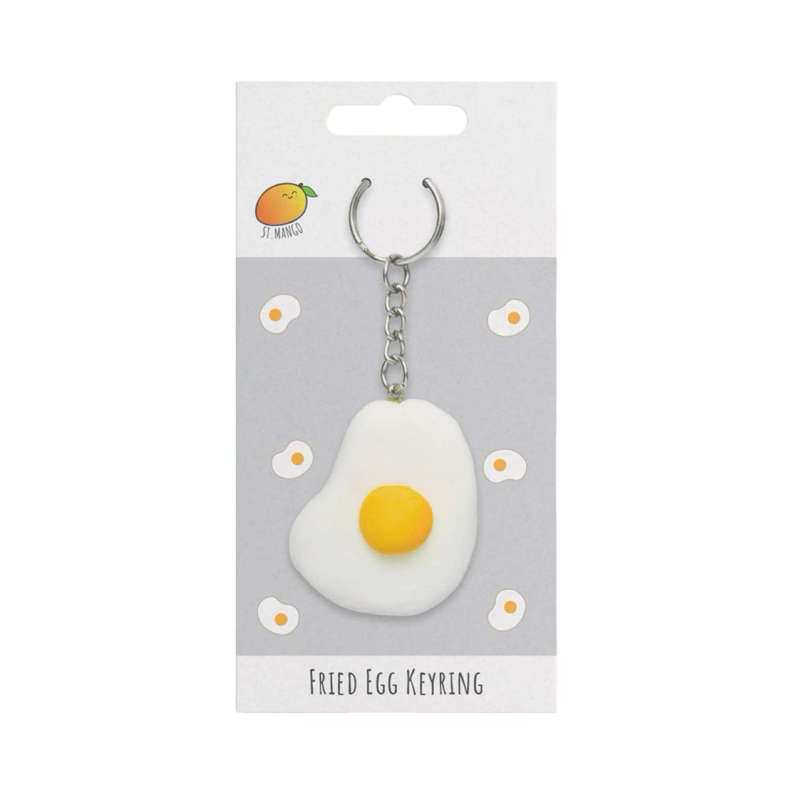 Fried egg keyring on a gray card with brand logo.