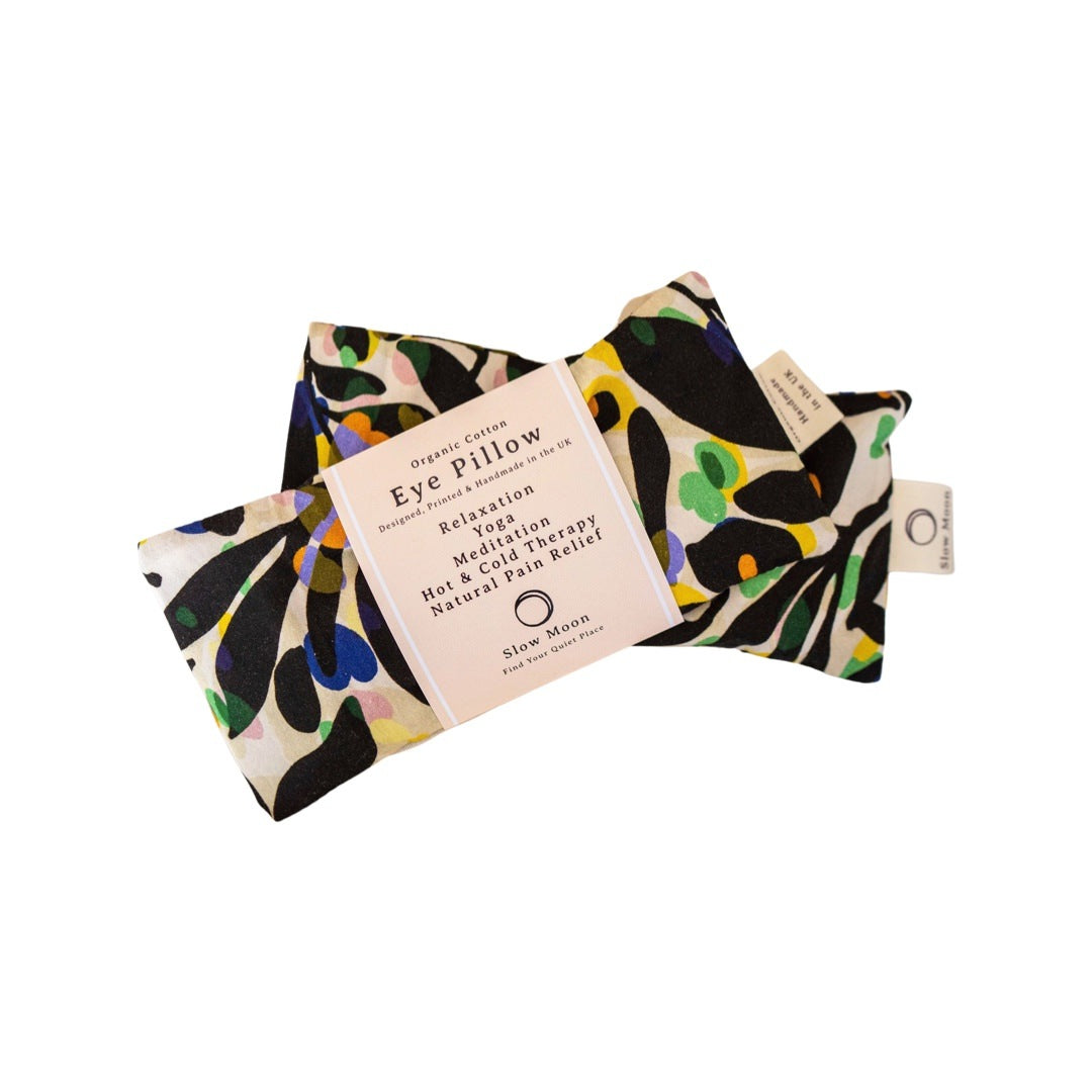 This fronds organic cotton eye pillow is handmade and filled with grain.