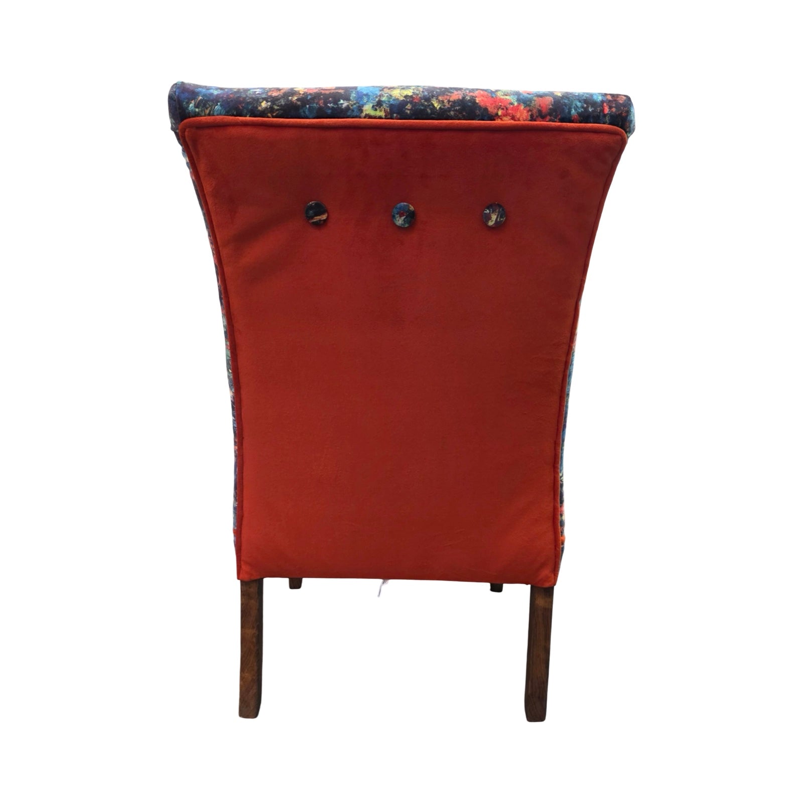 Red chair with floral-patterned backrest on a white background.