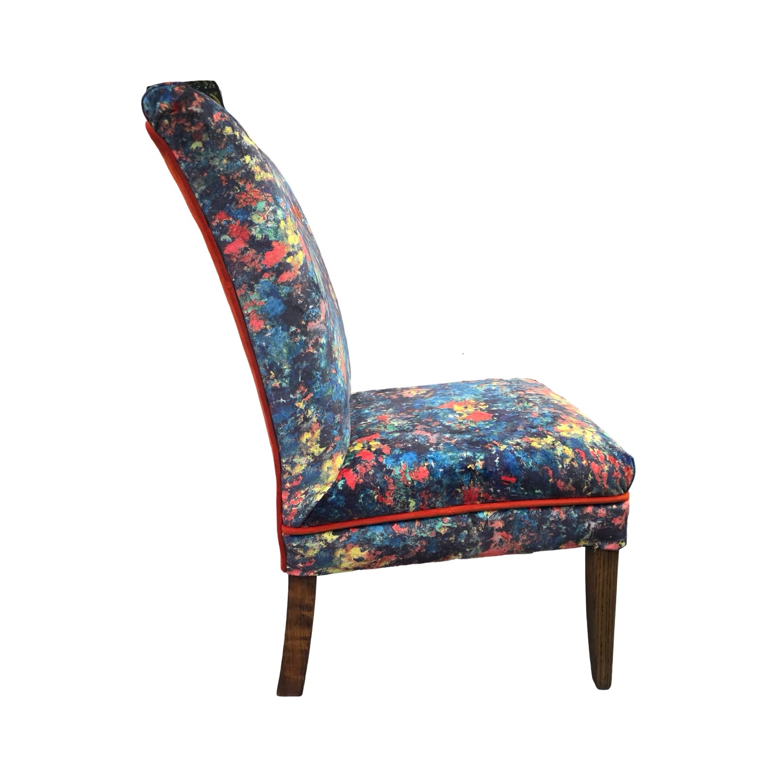 Colorful floral-patterned chair on a white background.