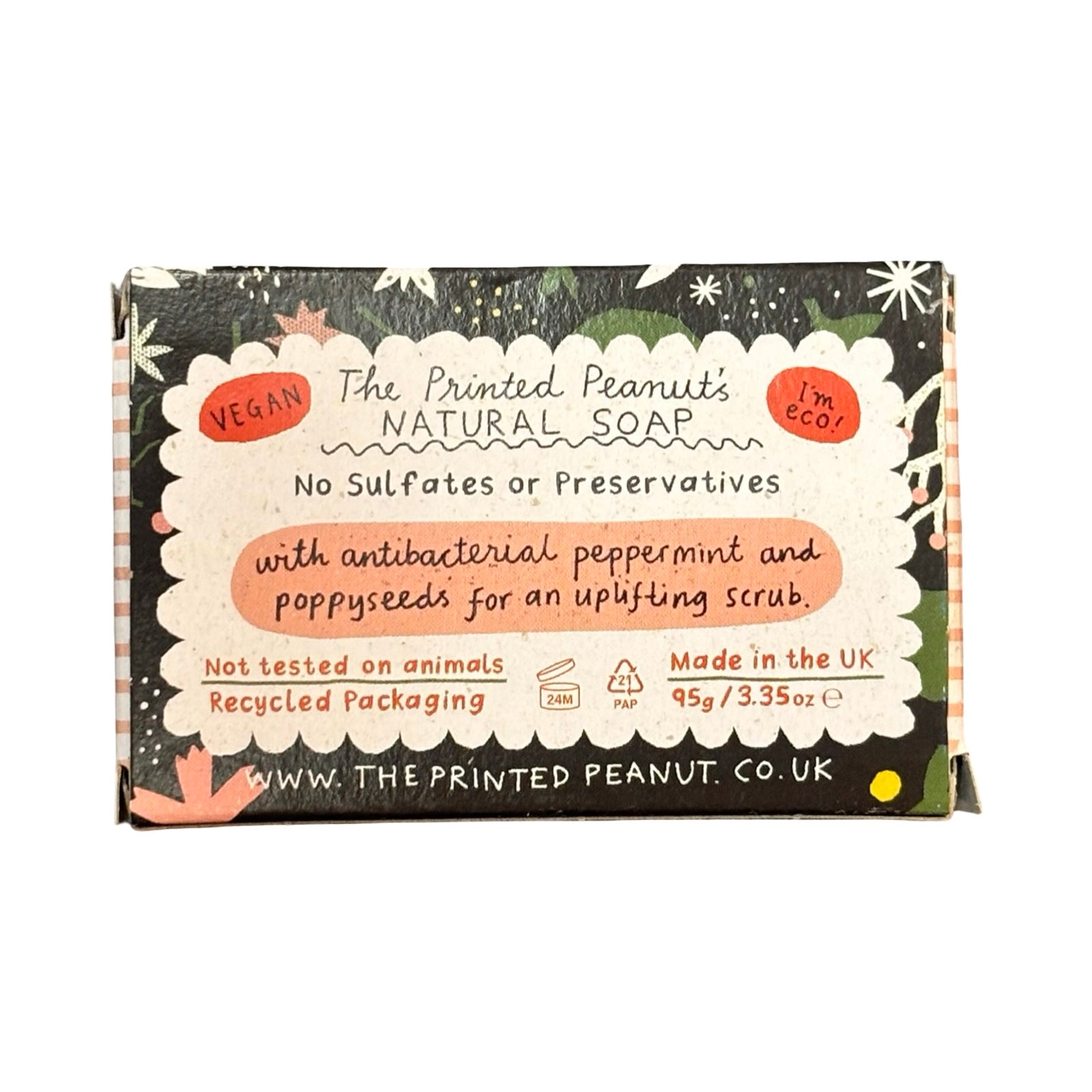 Bar of soap with packaging featuring text about natural ingredients and eco-friendly practices.