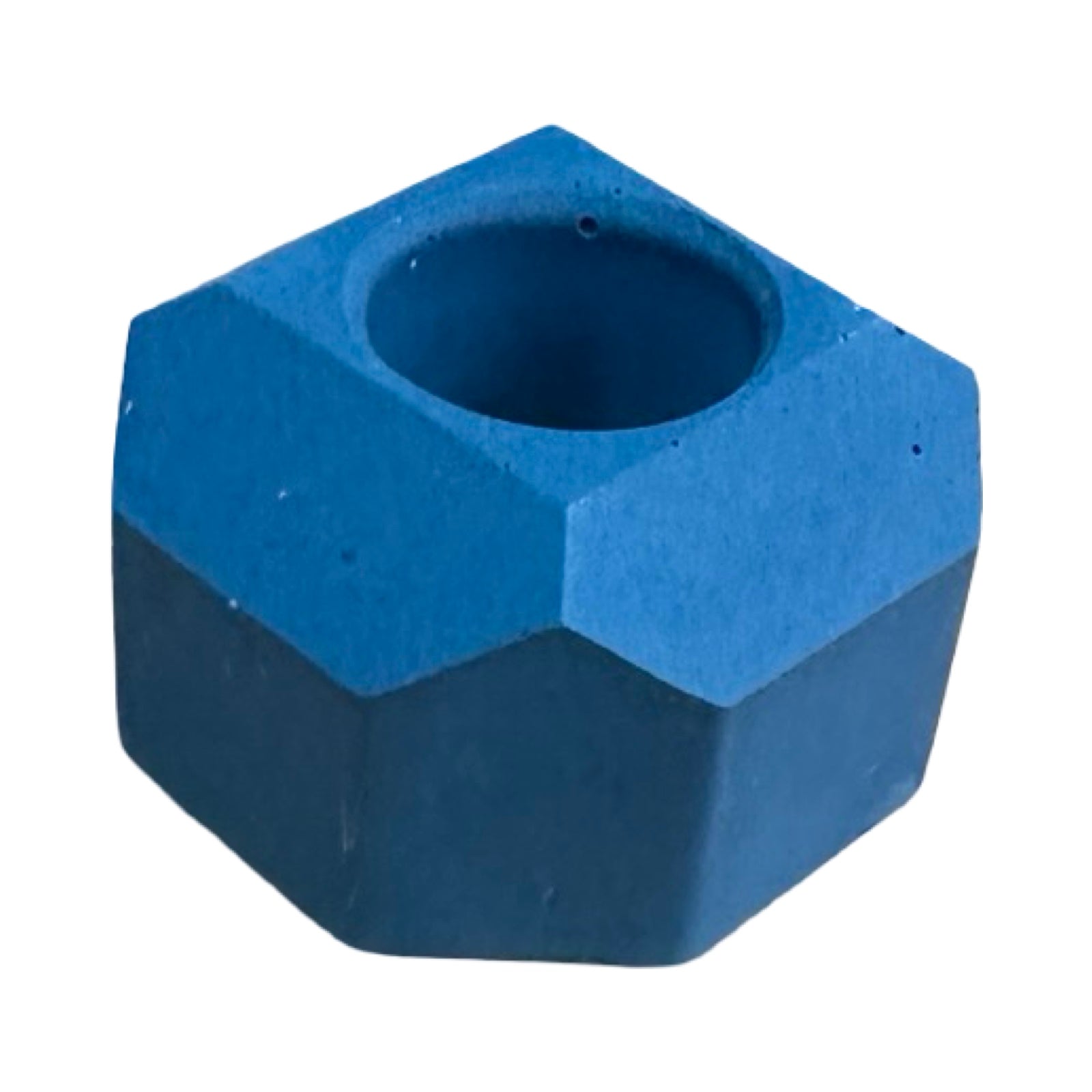 A small geometric shaped dinner candle holder in navy.