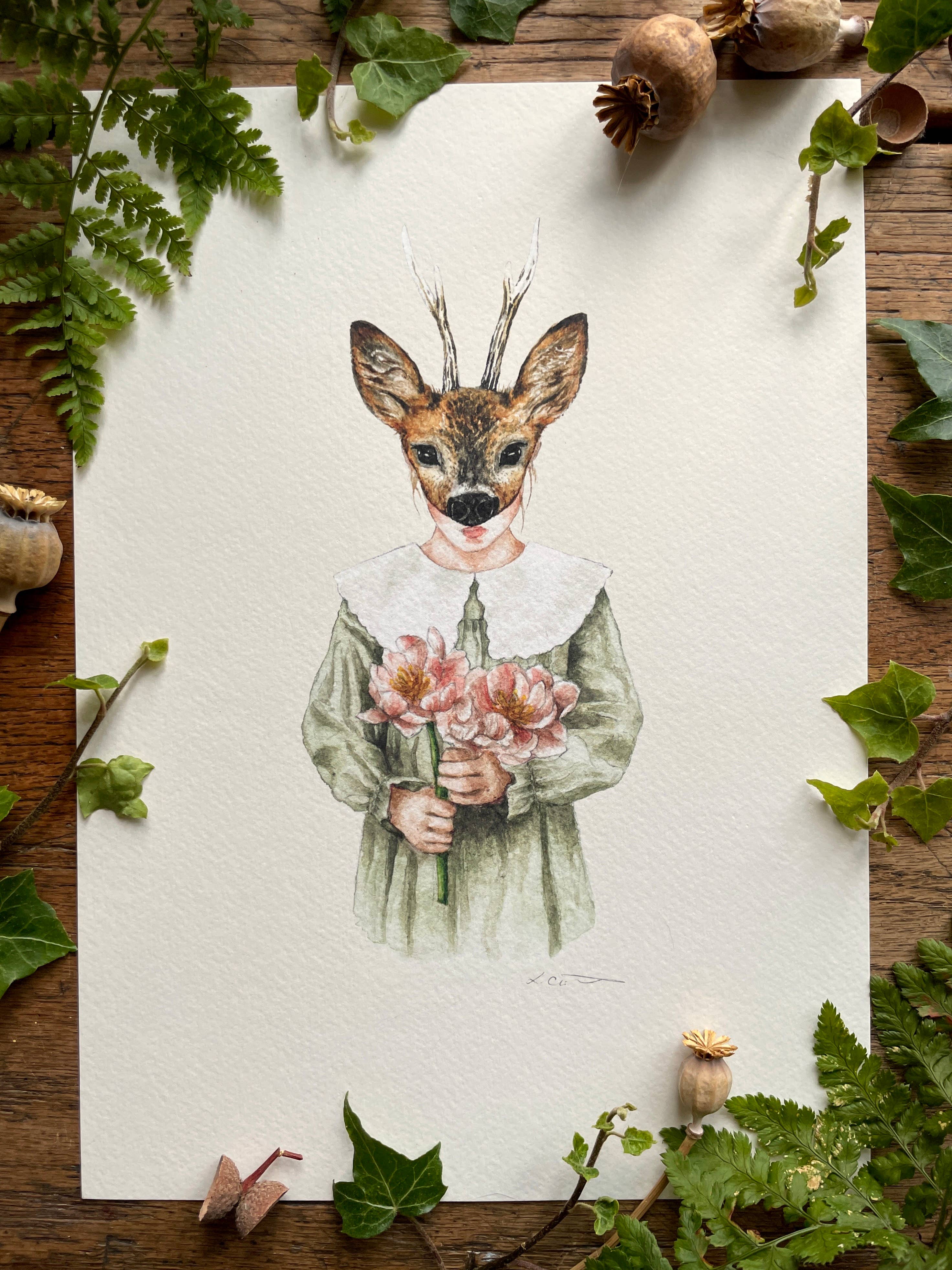 An art print of a girl wearing a deer mask, dressed in a green dress with a fabulous lace collar and holding a bunch of pink flowers.