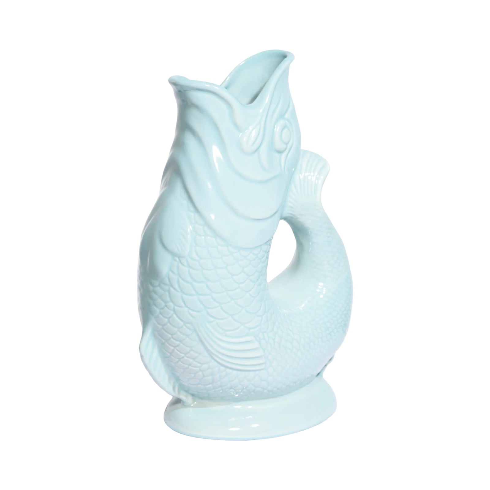 A mint coloured fish shaped gluggle jug.