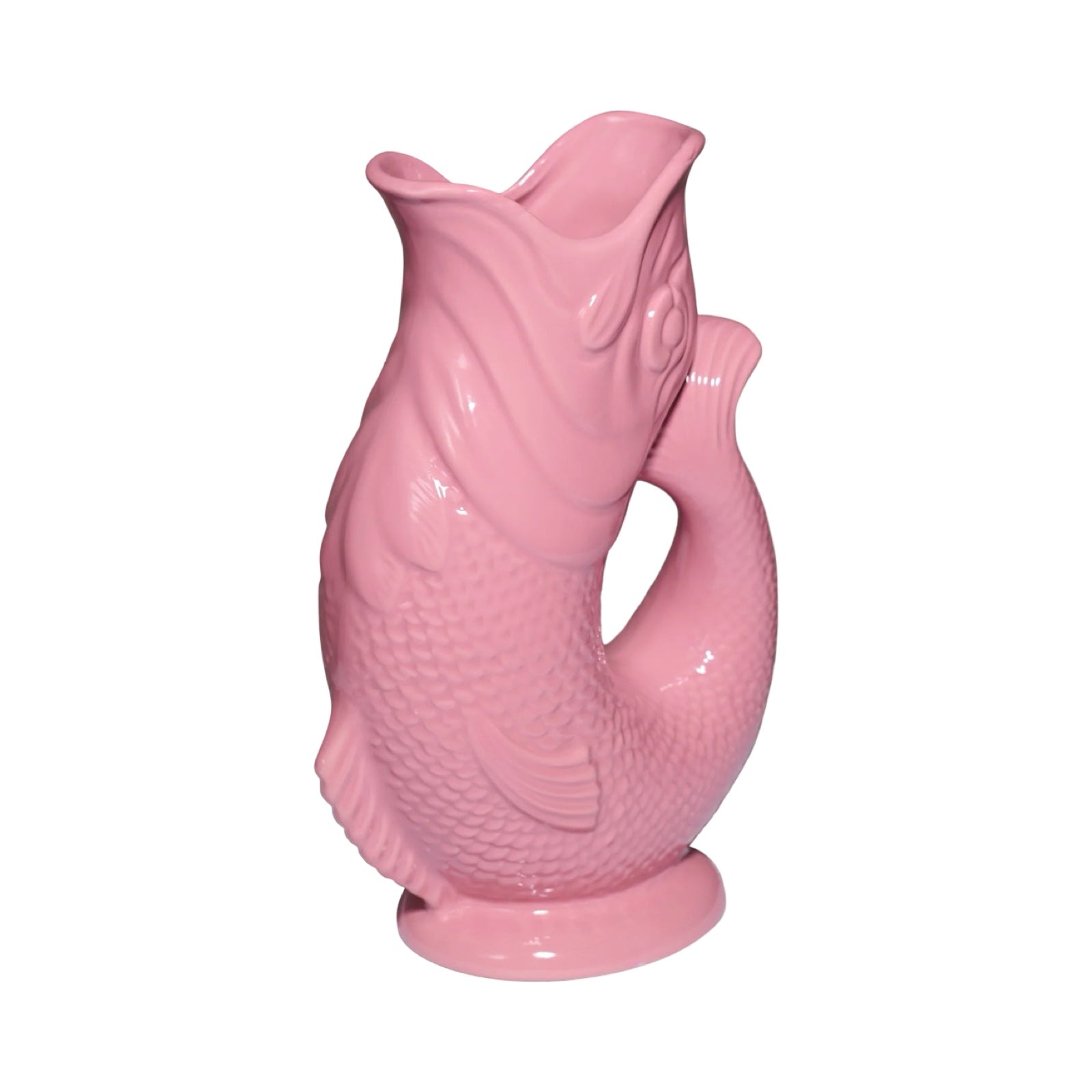 A pink fish shaped gluggle jug.
