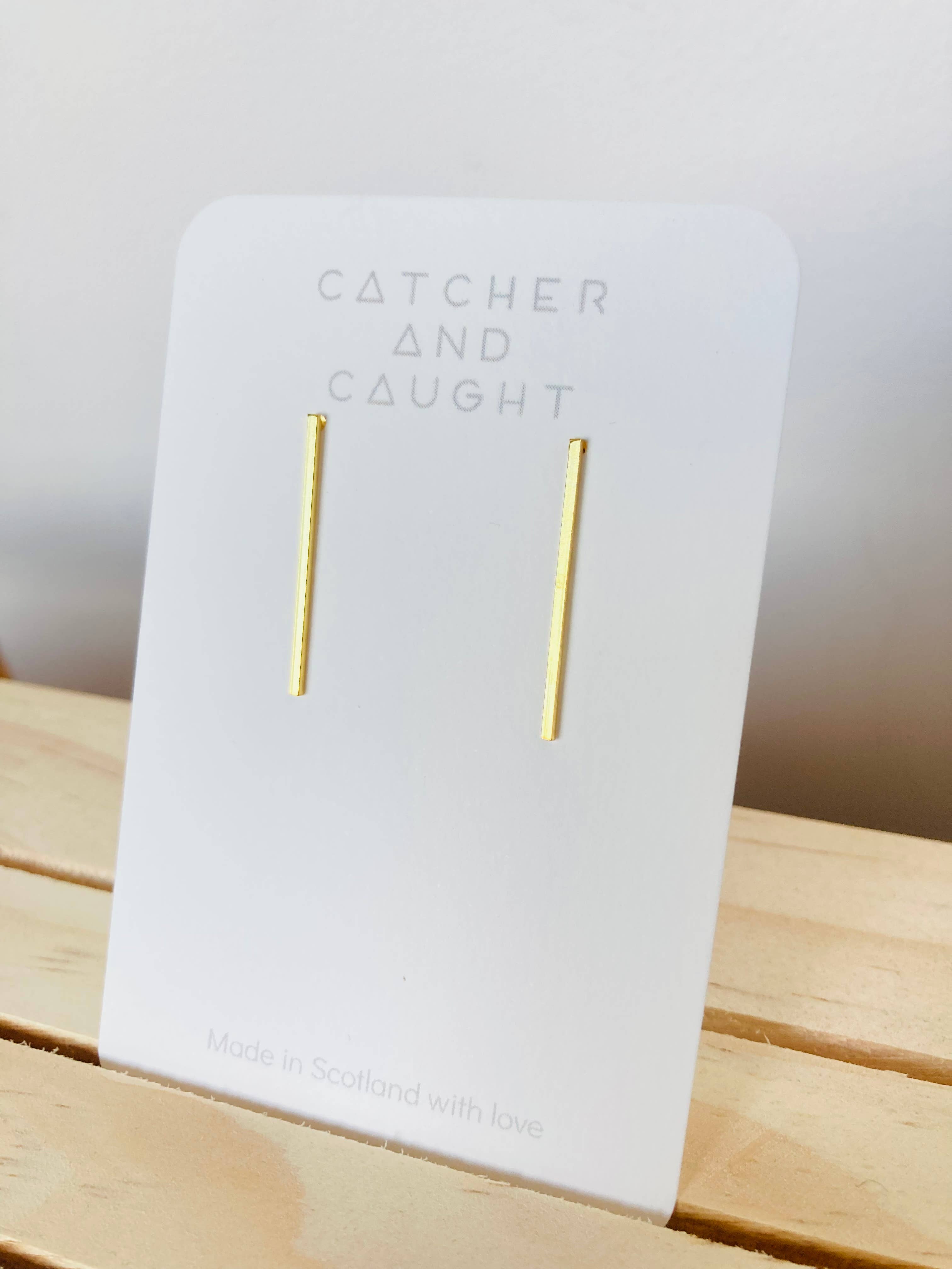 A simple classic, gold vermeil bar studs with butterfly backs. Comes on a backing card.