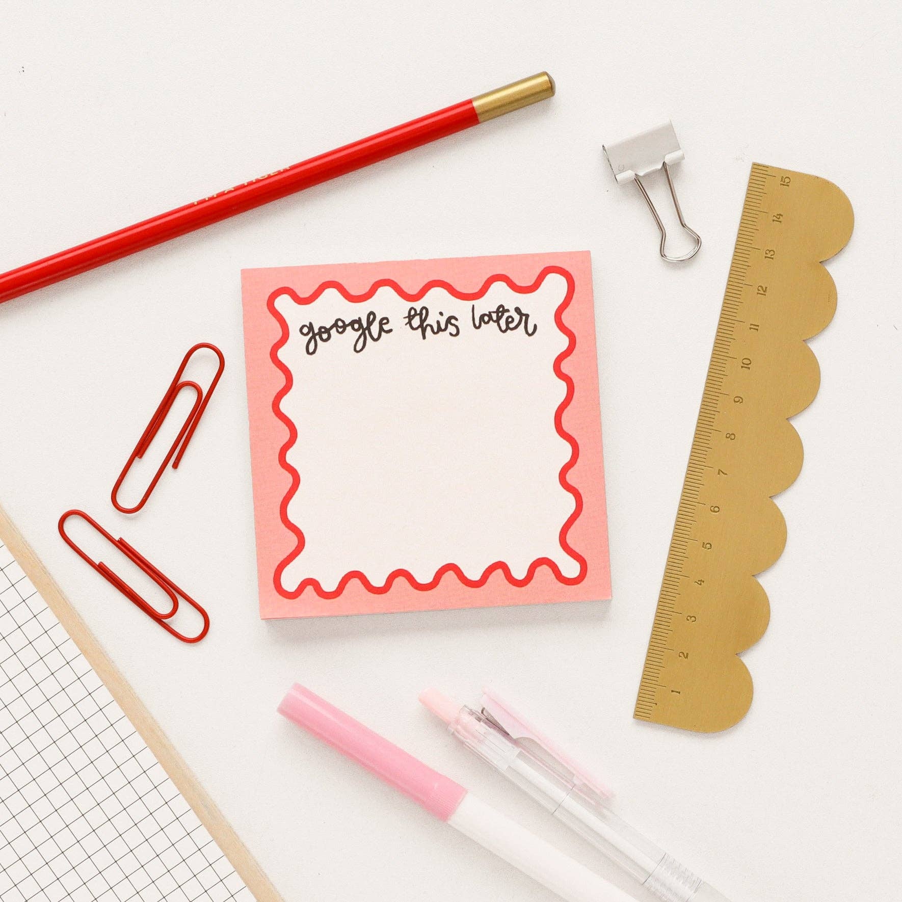 This 'google this later' memo pad features a pink border with a red squiggly border.