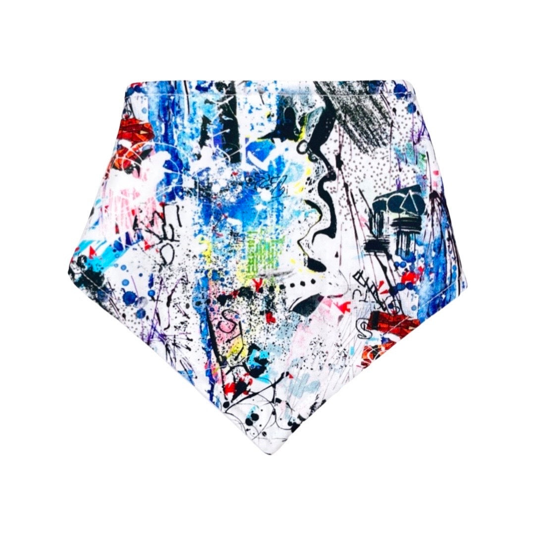 A white bandana bib with a graffiti print design.