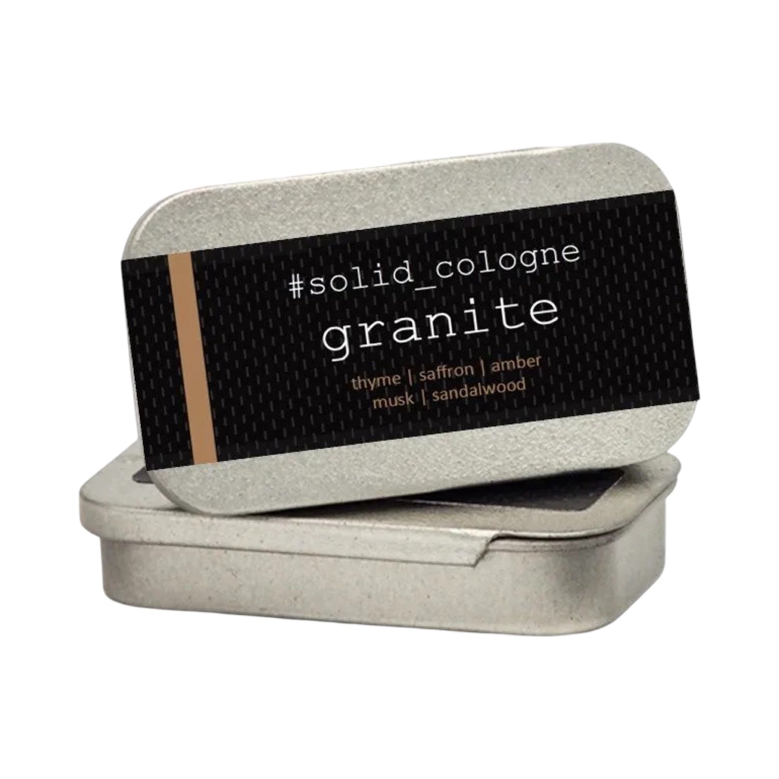 Granite Solid Cologne, A rich floral woody musk fragrance combining notes of rose, saffron, thyme and tea with base notes of amber, suede musk and sandalwood, all in this little tin!