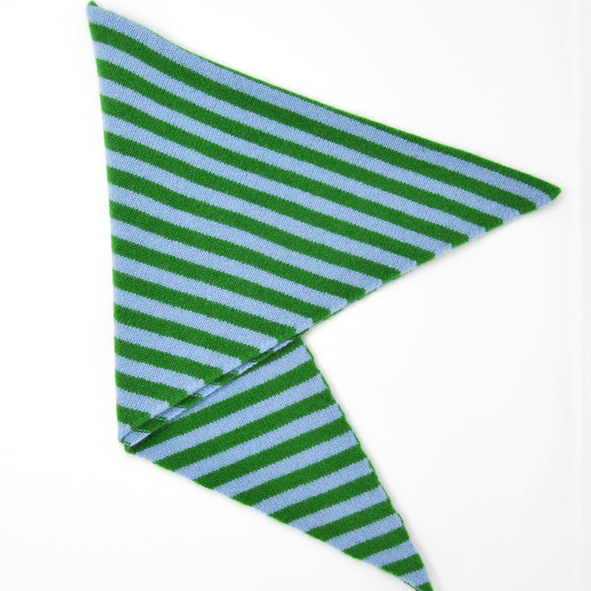 Green and blue striped fabric on a white background.