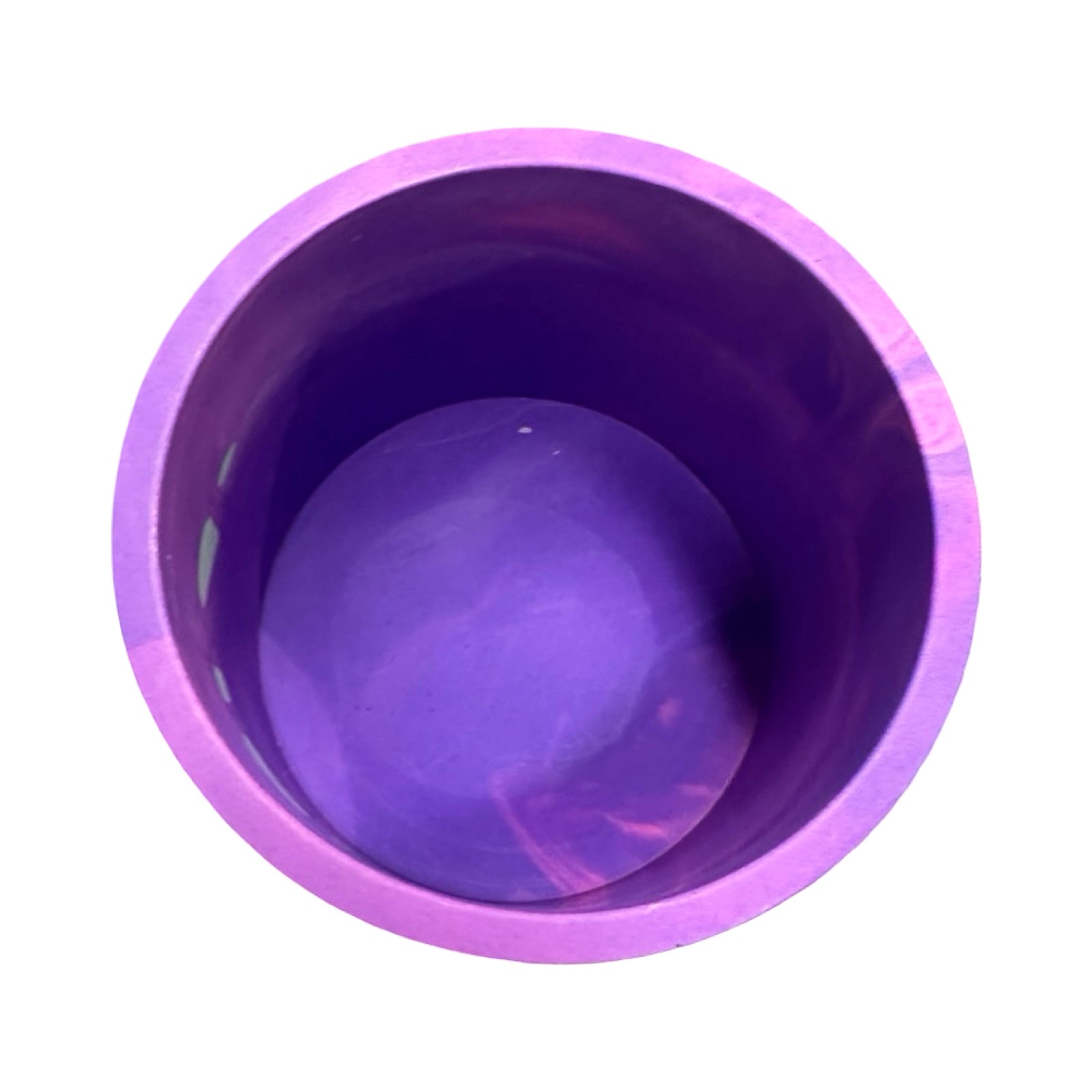 Inside of a purple planter.