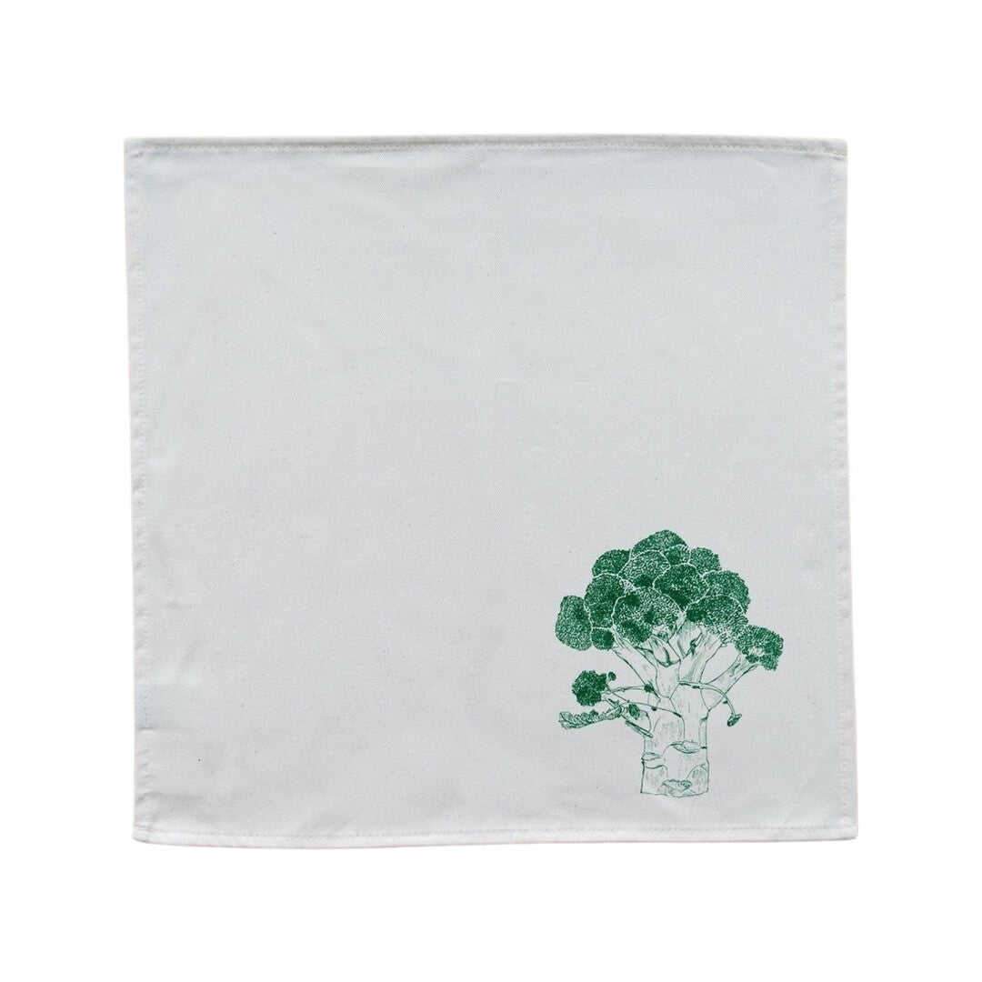 Cream cotton napkin with a green broccoli.