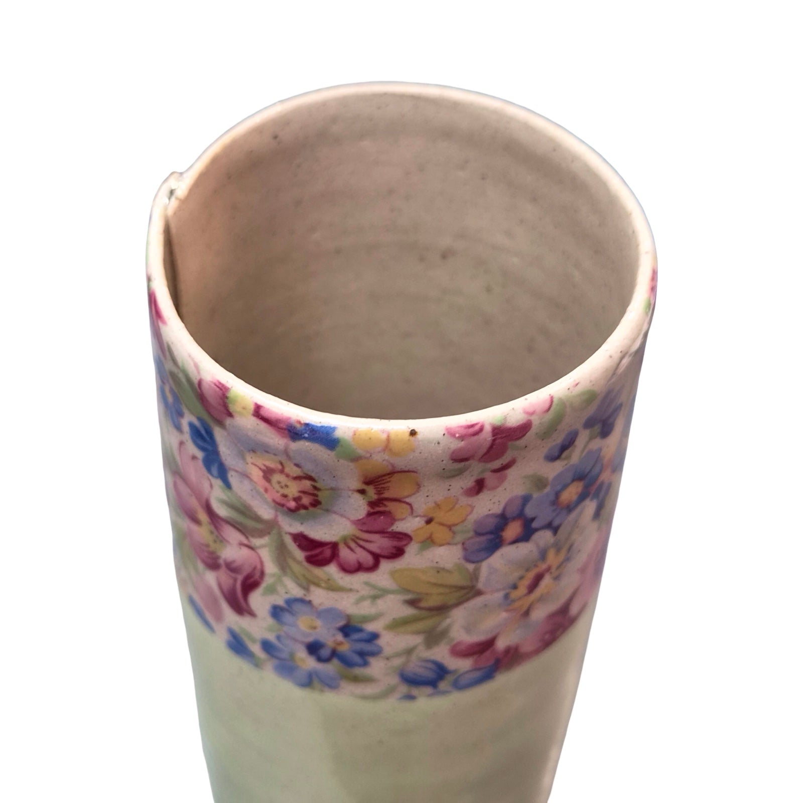 Ceramic vase with floral pattern on a white background.