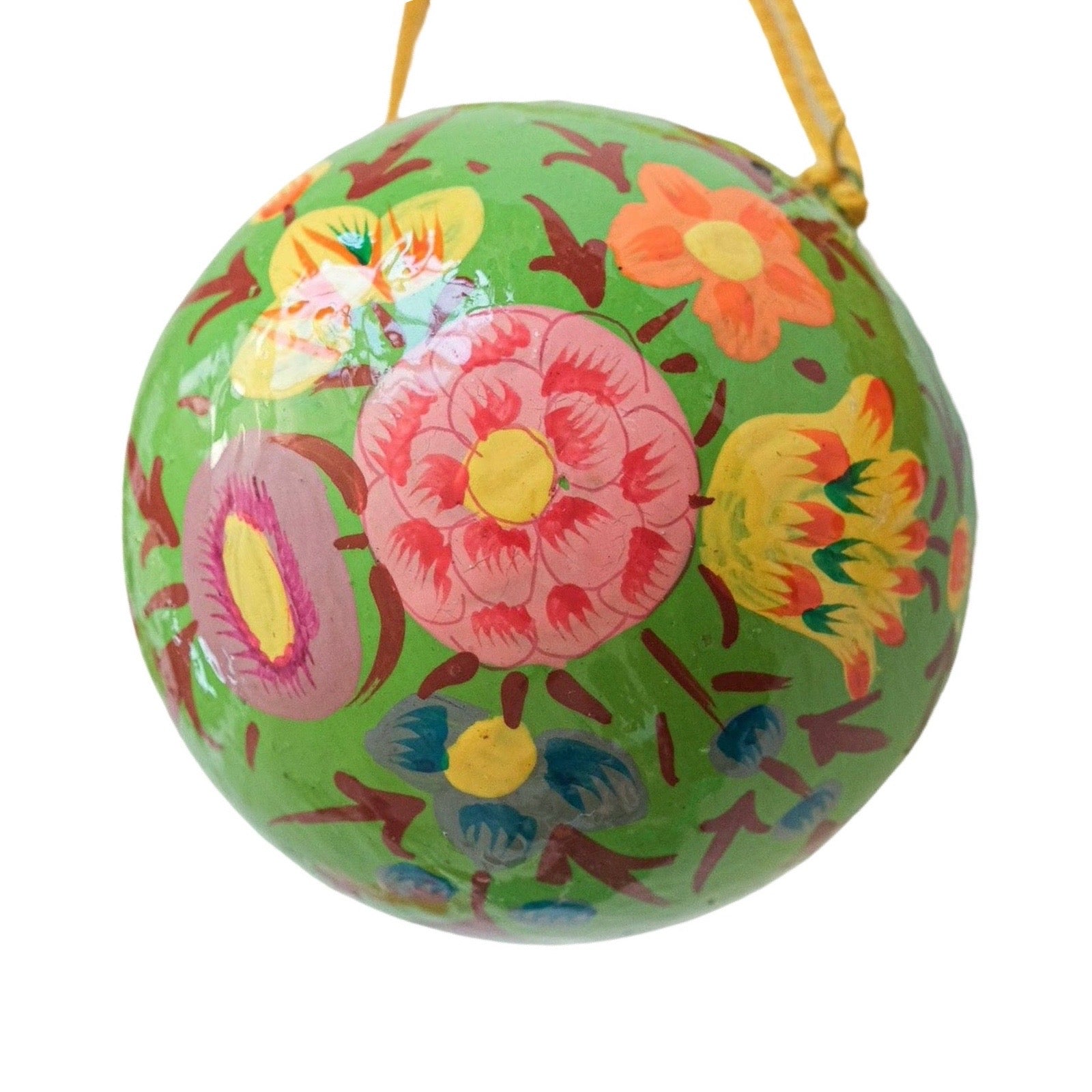 Decorative bauble with floral patterns on a white background.