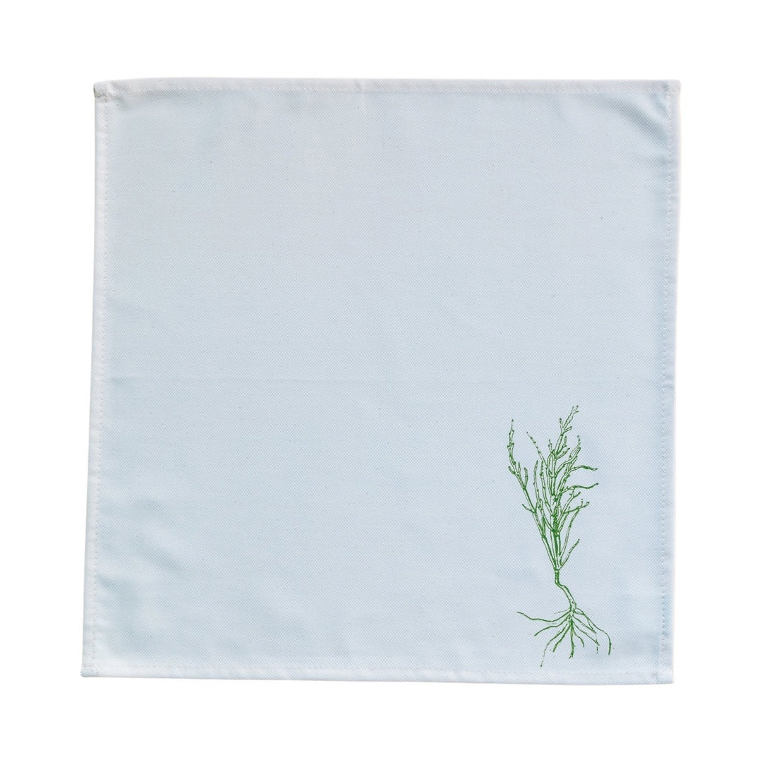 Cream cotton napkin with a green samphire.