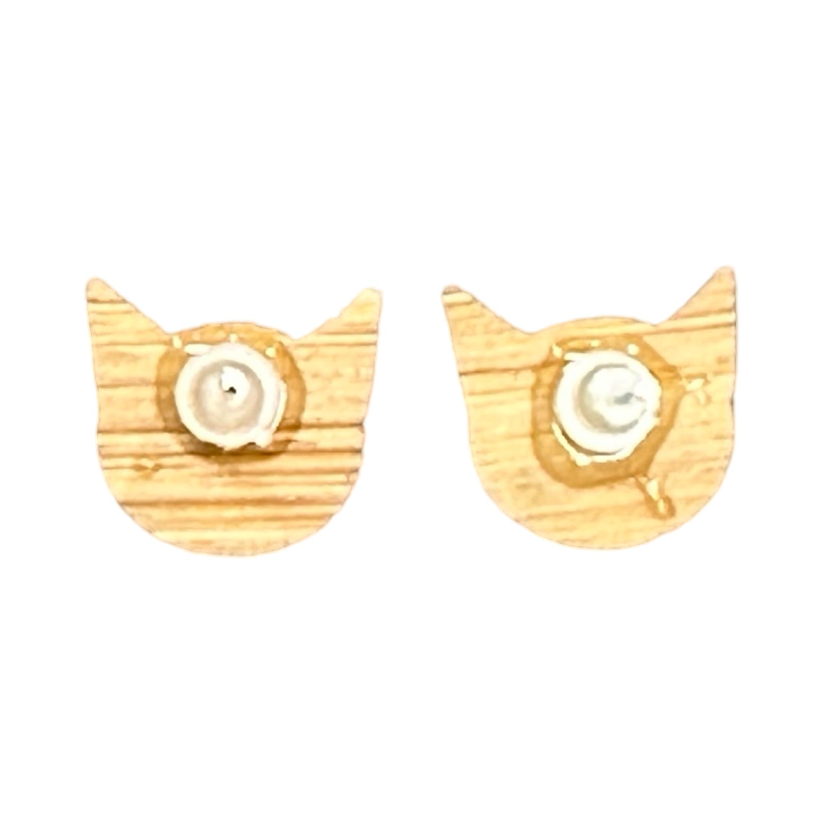 The bamboo backs of cat head-shaped stud earrings.