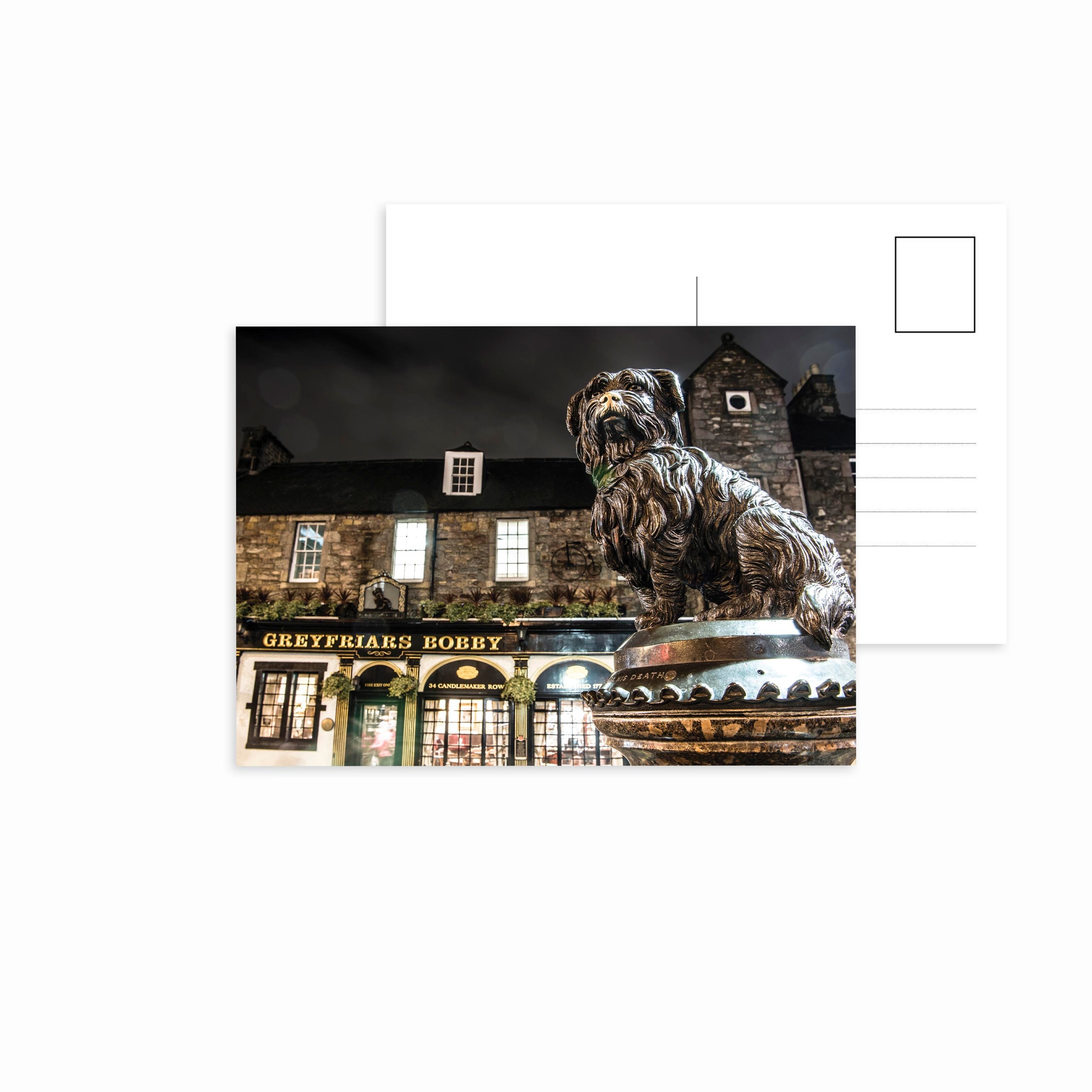 An image of the Greyfriars Bobby Statue, Edinburgh on a postcard. 