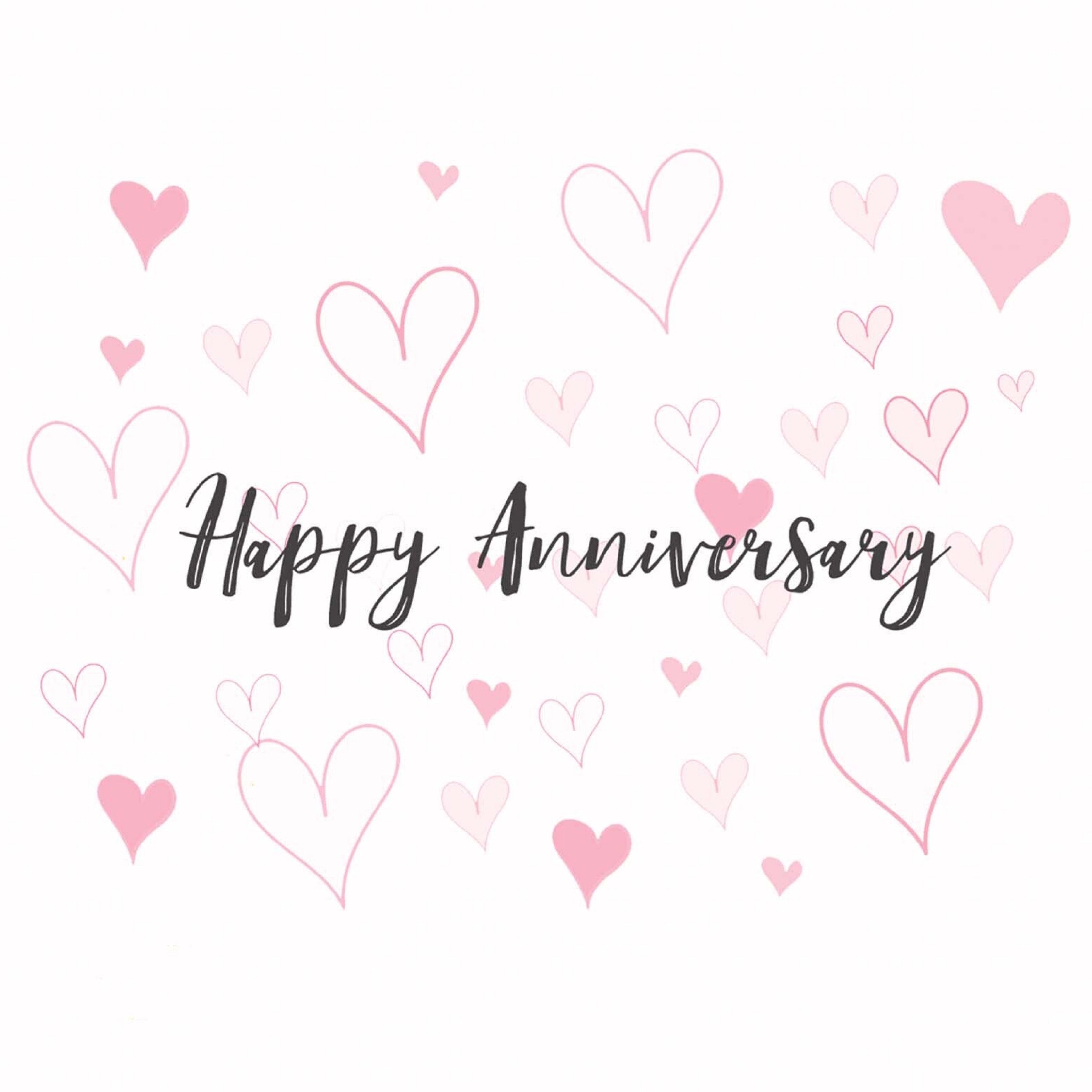 A greeting card with 'Happy Anniversary' text surrounded by heart designs, blank inside.