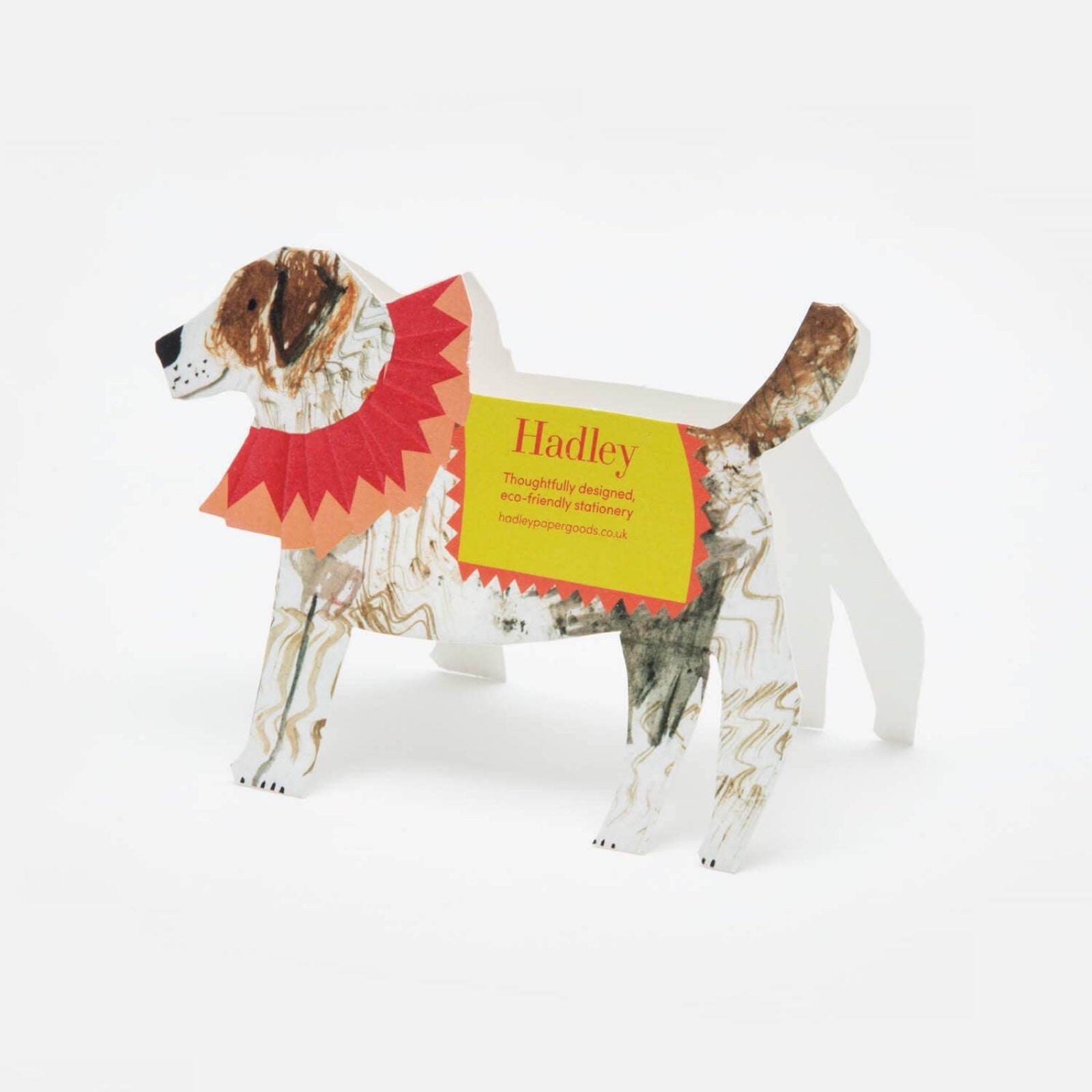 This fabulous dog-shaped birthday card features a brown and white Jack Russell wearing a red party collar and a Happy Birthday blanket. 
