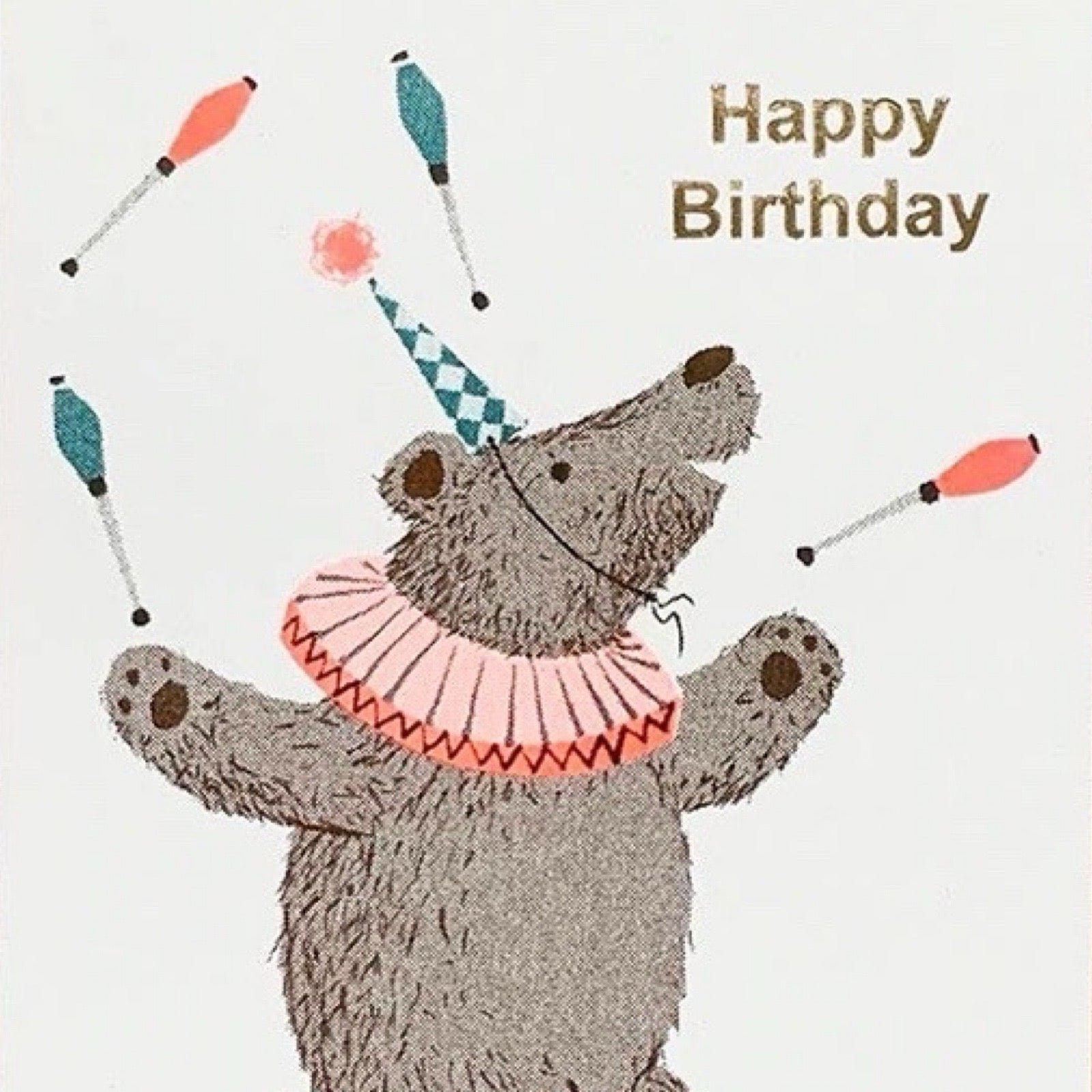 Birthday card featuring a bear juggling skittles whilst riding a unicycle and the text 'Happy Birthday' written in gold.