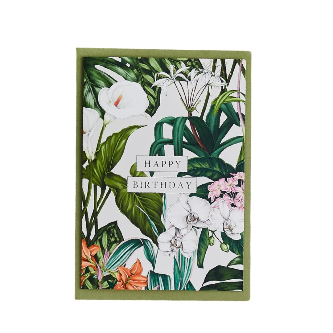 A6 card featuring tropical flowers and foliage and the text 'Happy Birthday' in gold, comes with a green envelope.