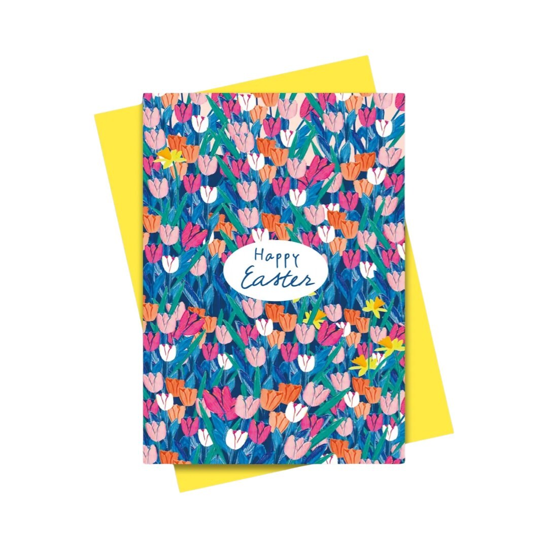 Easter card featuring colourful tulips and daffodils with the text 'Happy Easter'.