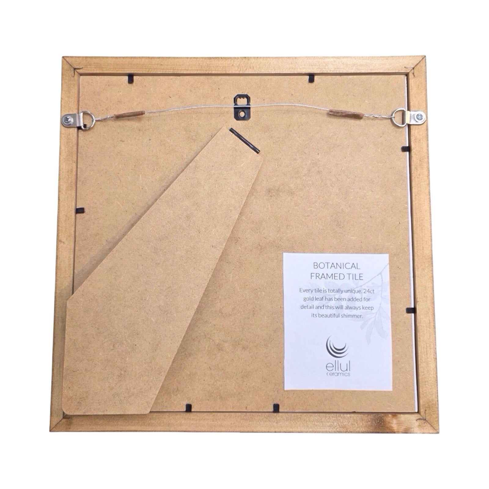 Back of framed botanical tile featuring hardy geranium in a wooden frame on a white background