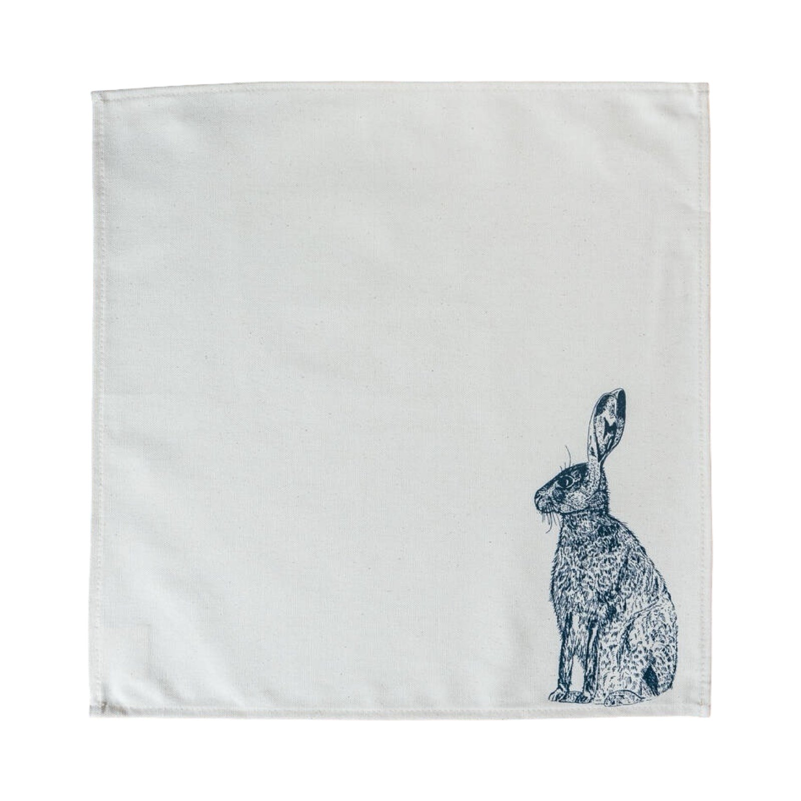 Screen-printed cream serviette featuring an original illustration of a blue hare. 