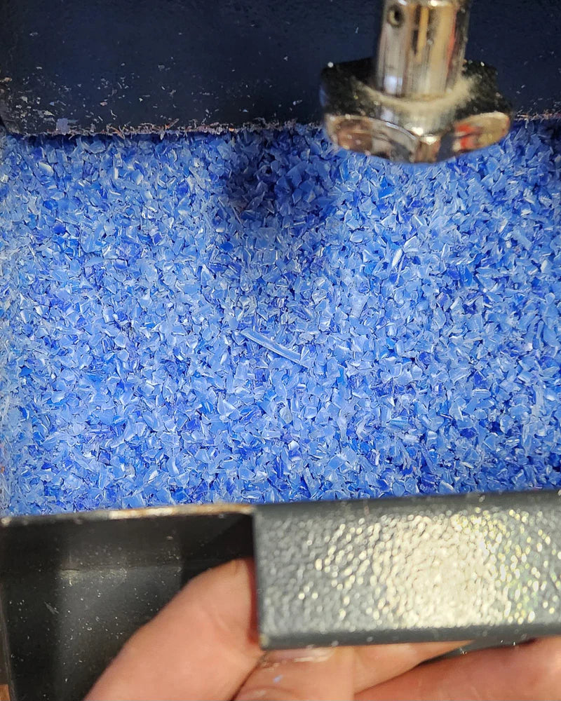 Close-up of a blue plastic pieces.