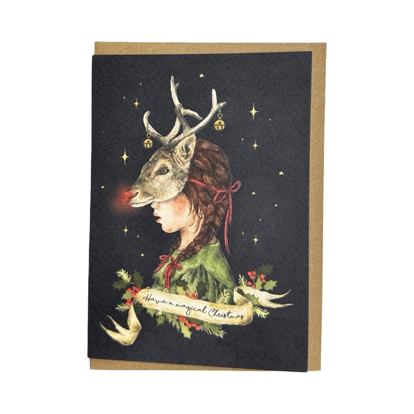A gorgeous Christmas card of a girl wearing a Rudolph mask, dressed in a green dress. The text 'Have A magical Christmas' is written in a cream banner underneath.