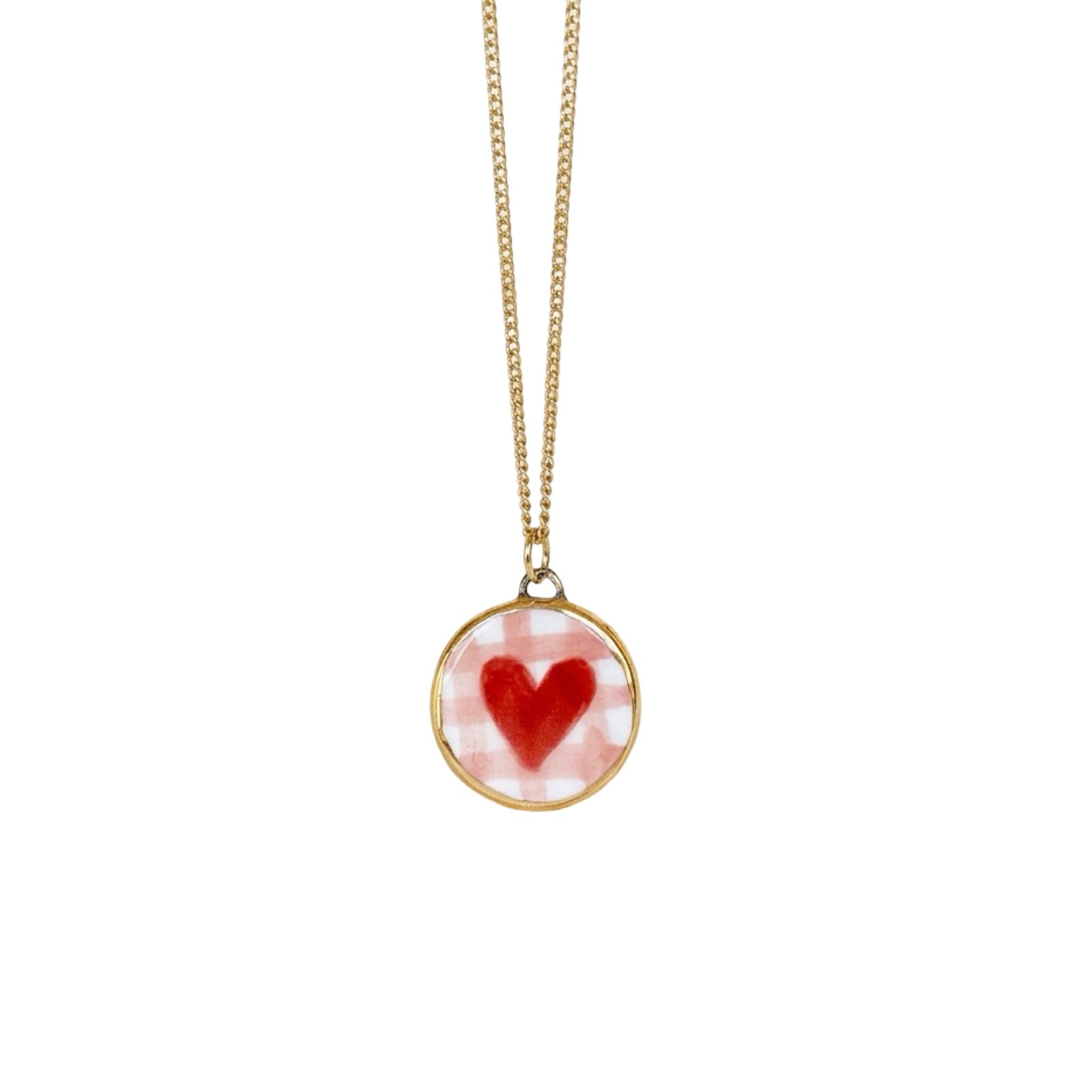 Necklace with a heart-shaped pendant on a white background.