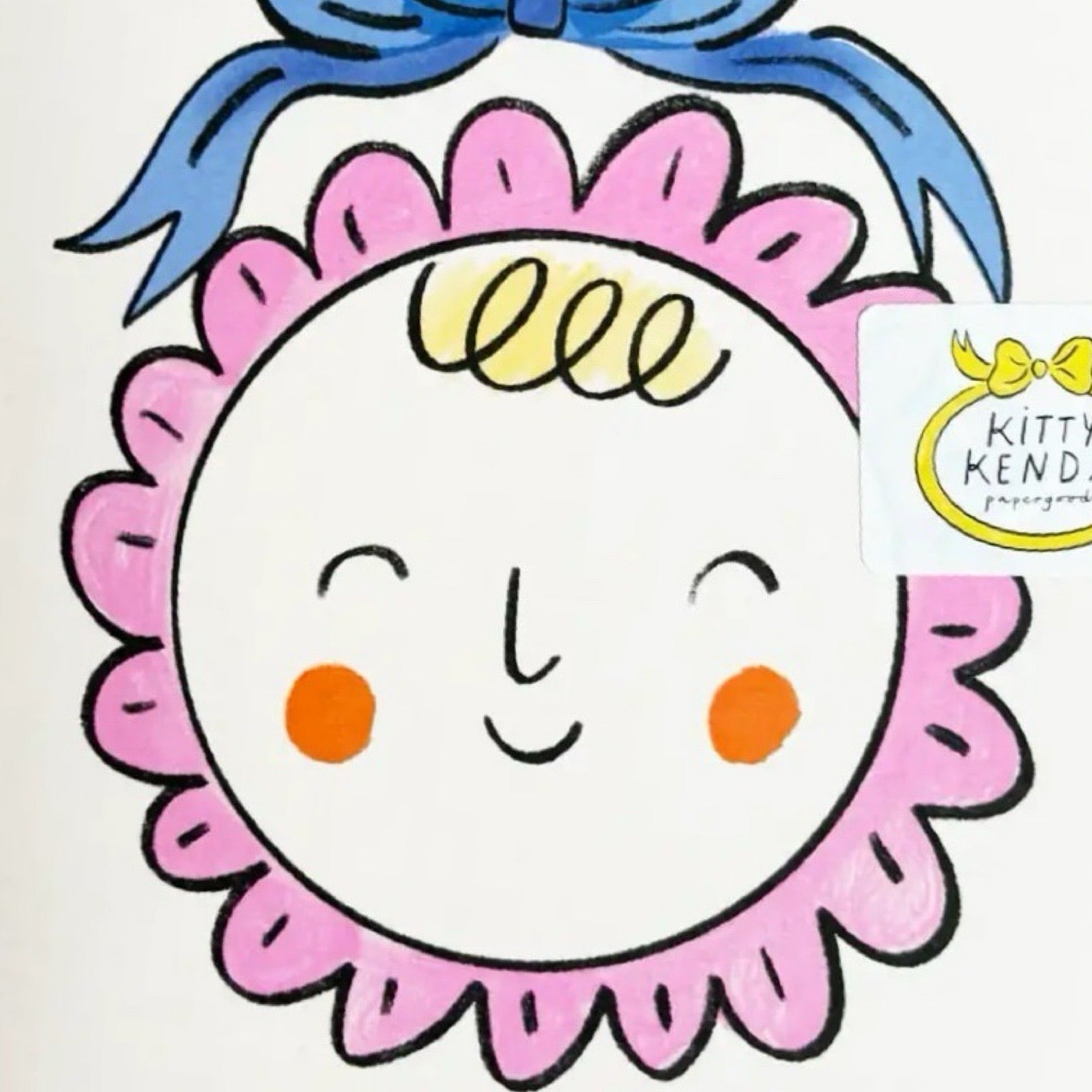 New baby card featuring the text 'hello baby' above a baby's face wearing a pink hat with a large blue bow.