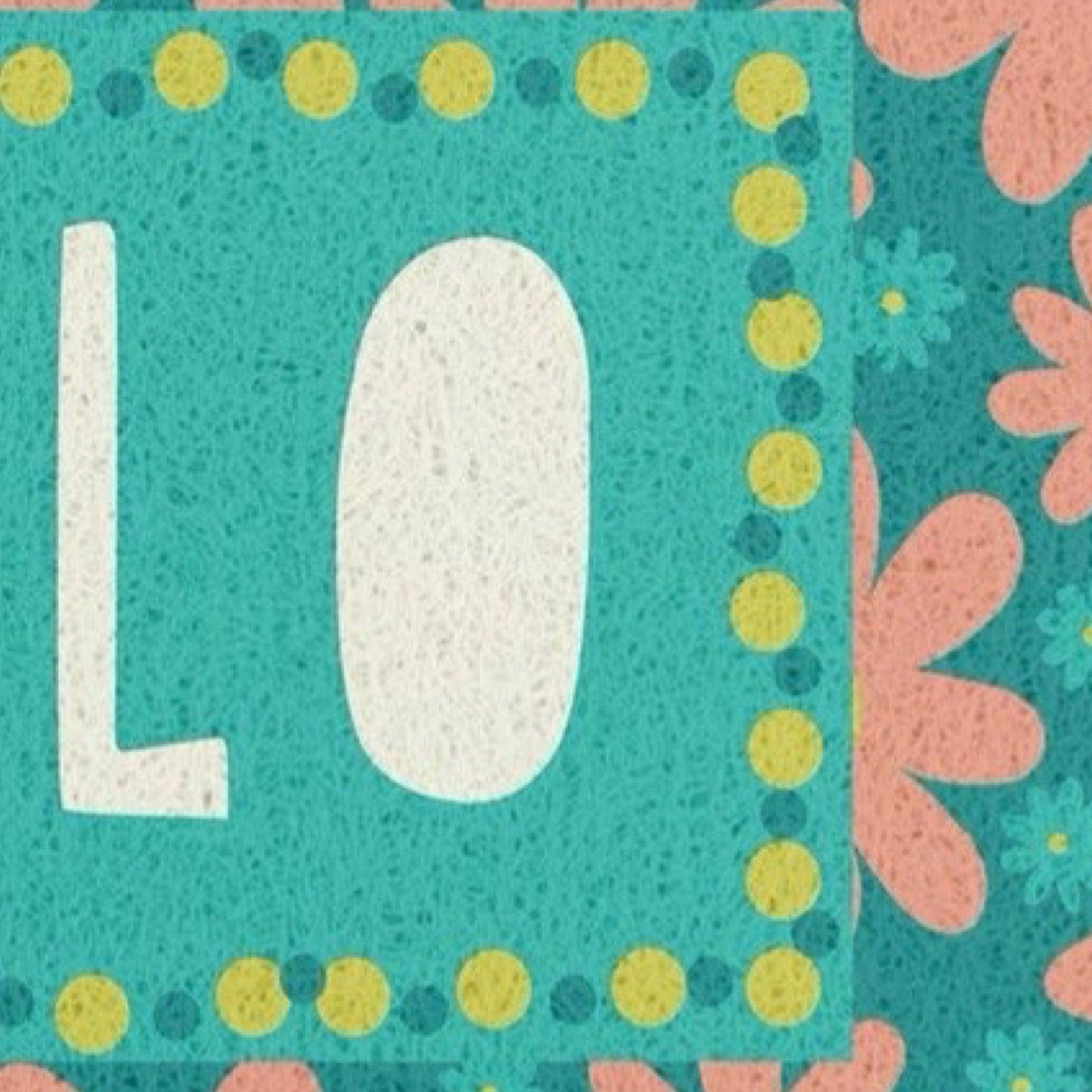 A close-up of a decorative door mat with the large white letters 'L' and 'O' on a turquoise background, surrounded by yellow and teal dots and pink floral shapes.