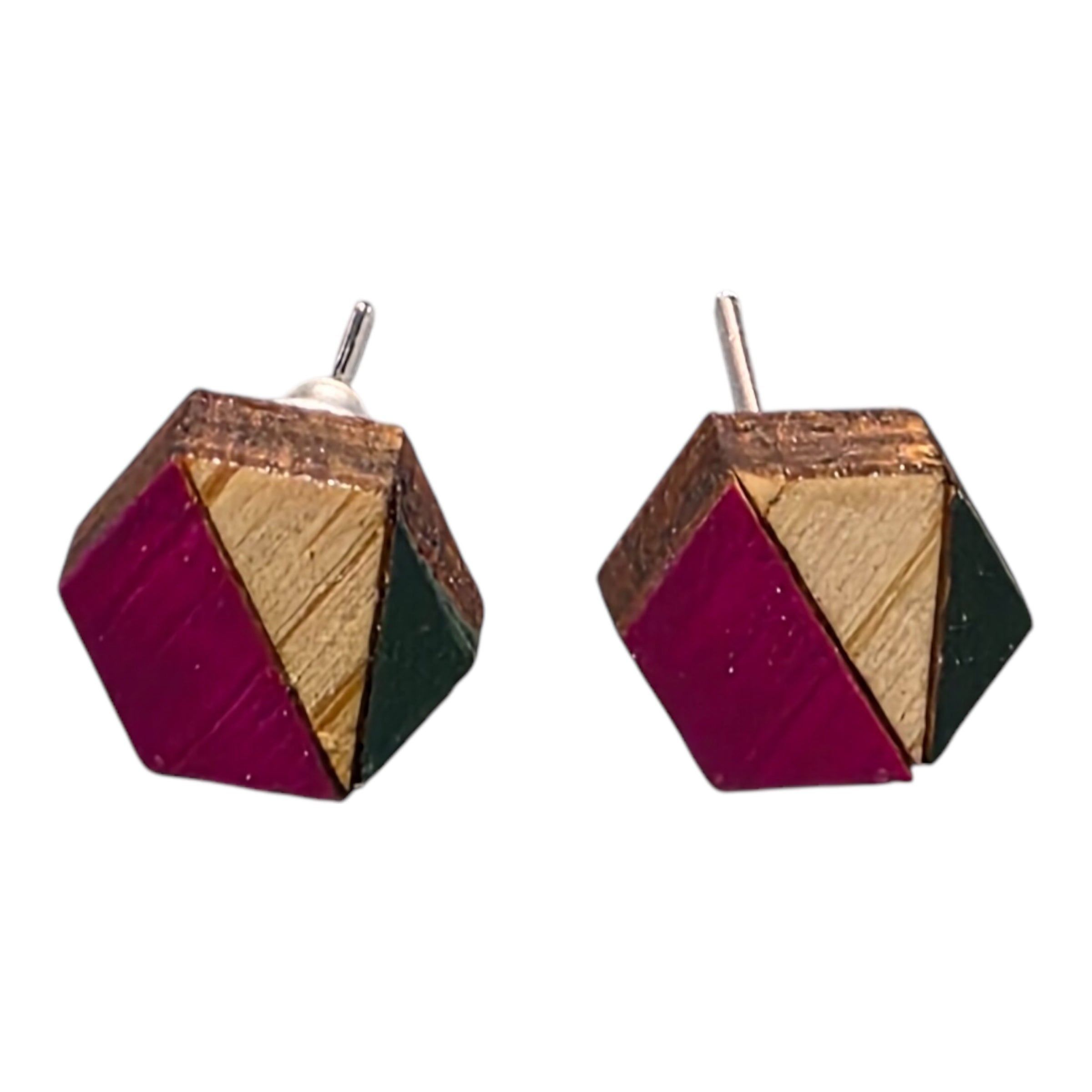 A pair of pink and navy hexagonal bamboo stud earrings.