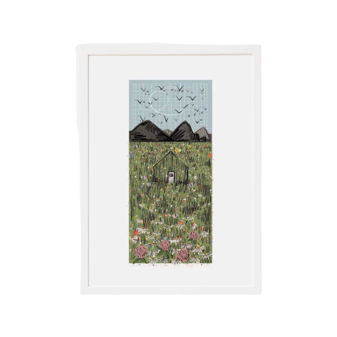 A beautiful print of a hidden cabin in the meadow with mountains on the background and birds circling overhead