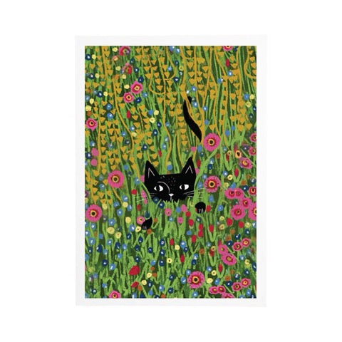 Cat print featuring an illustration of a black cat peeking through the flowers in a meadow, based on the Gustav Klimt painting 'The Flower Garden'.