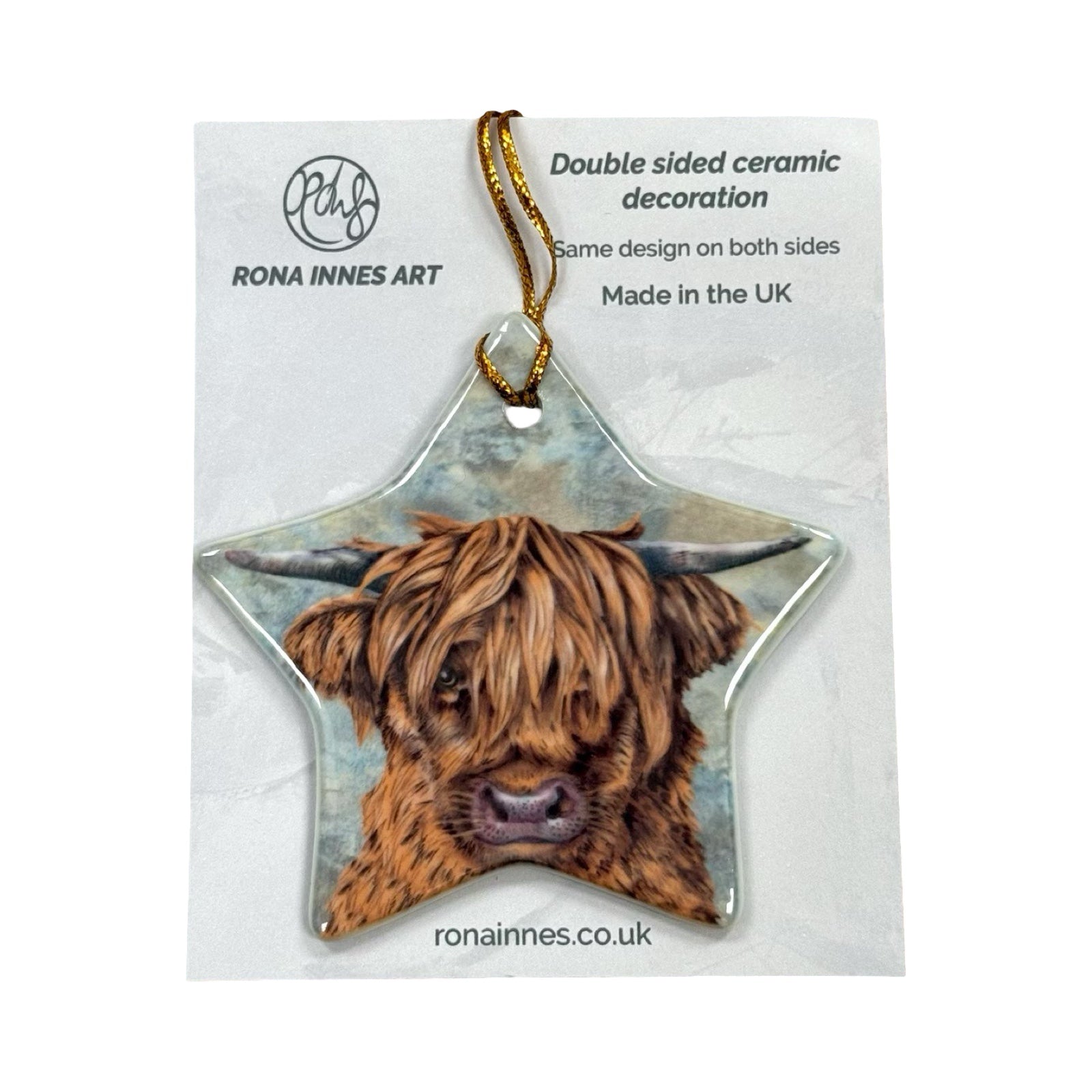 A star-shaped ceramic decoration featuring an illustration of the head of a highland cow.