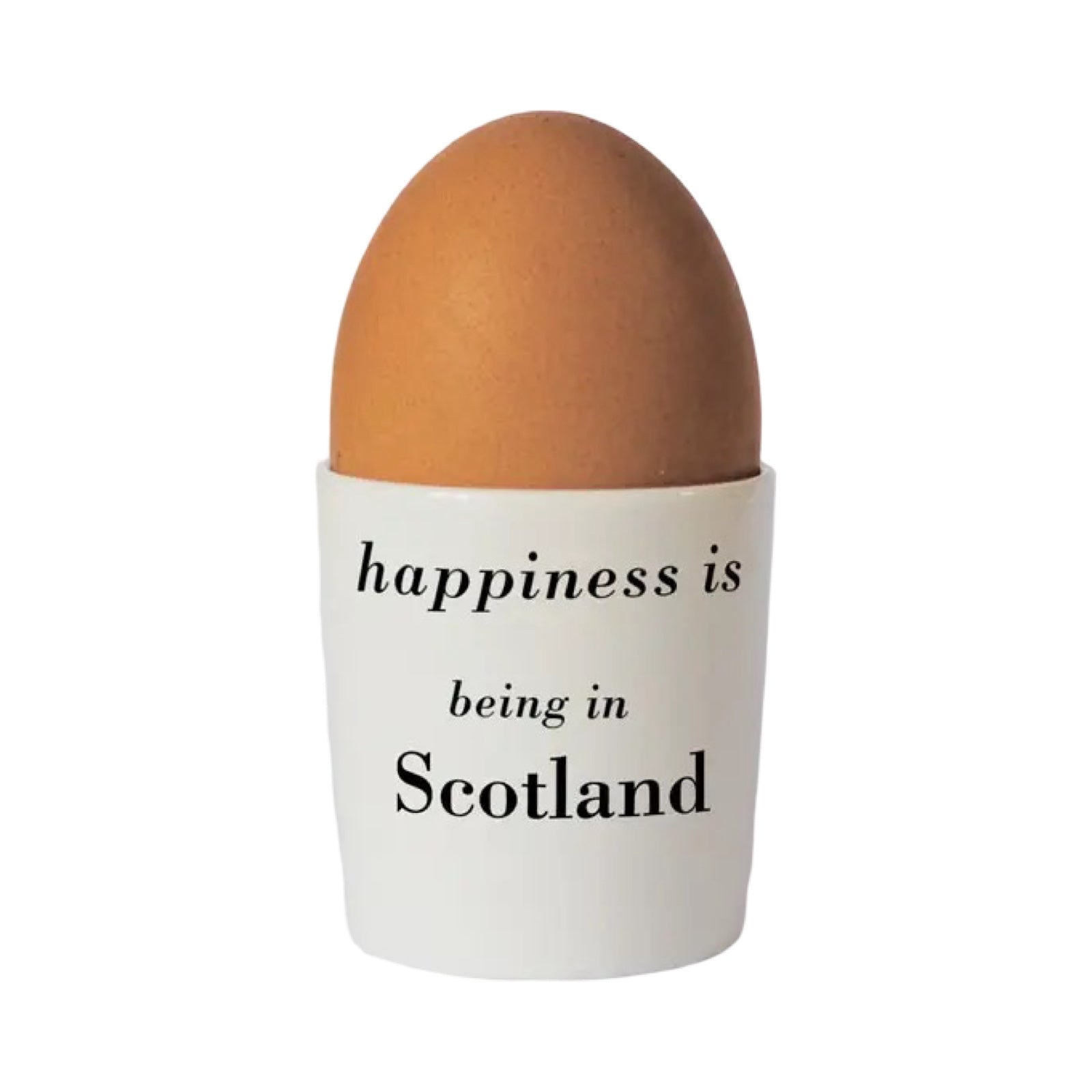 Bone china egg cup with an illustration of a turquoise highland cow in the front and the text 'happiness is being in Scotland' written in black on the back.