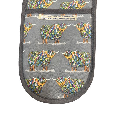 Grey oven gloves featuring multi-coloured highland cows.