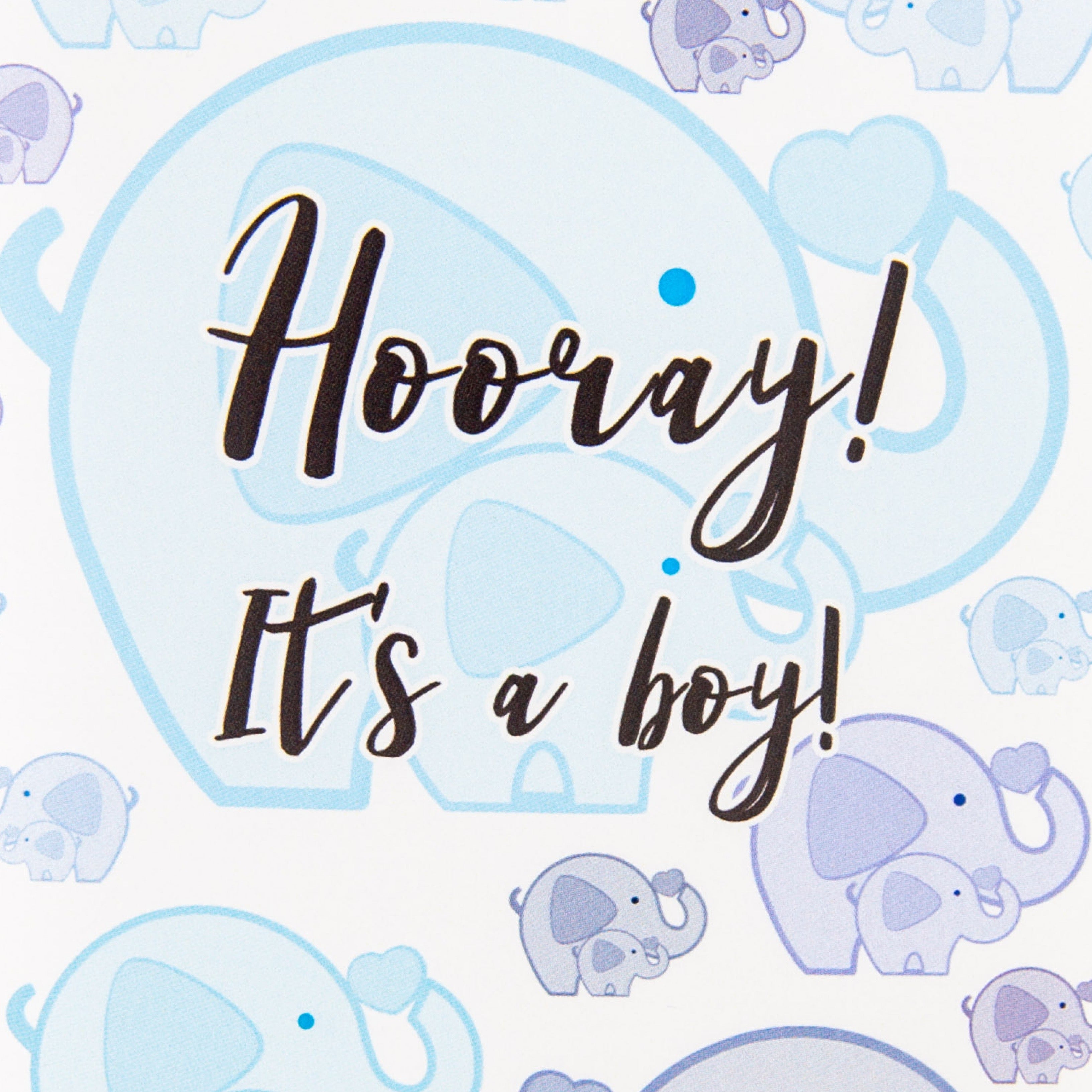 A greeting card with 'Hooray! It's a boy!' text and illustrations of blue elephants on a blue background.