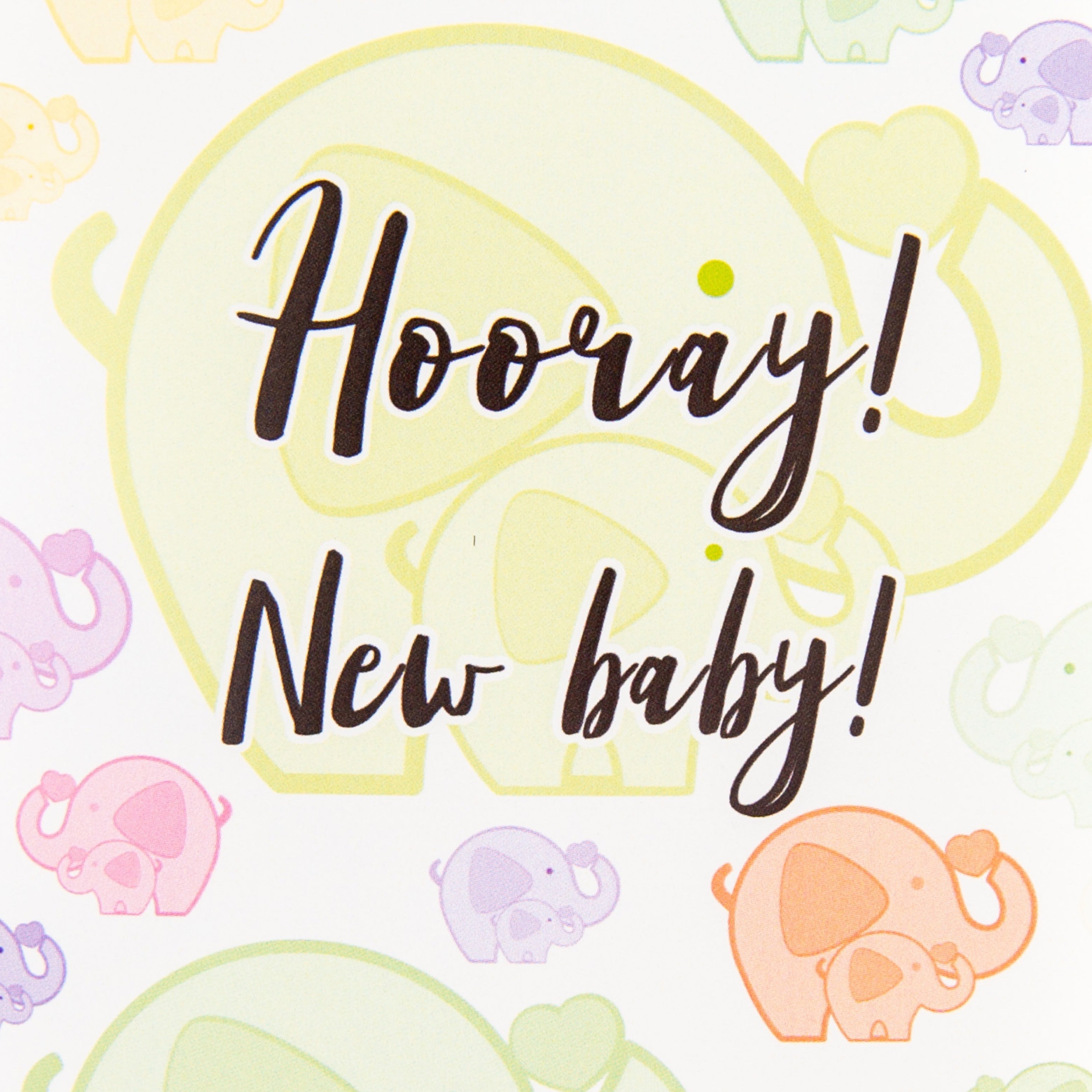A colourful greeting card with illustrations of elephants and the text 'Hooray! New baby!' on the front.