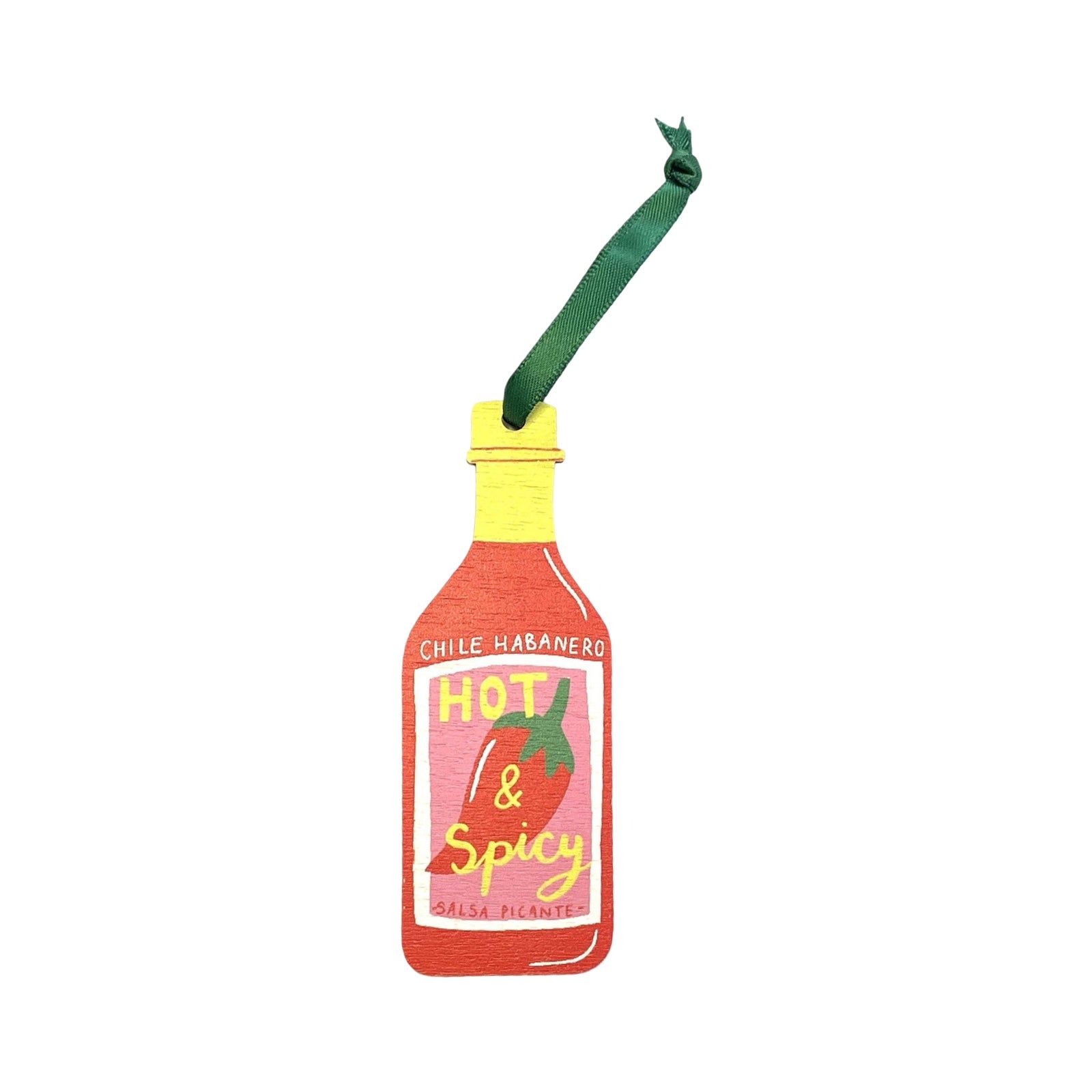 A wooden Christmas decoration of a bottle of hot sauce. 