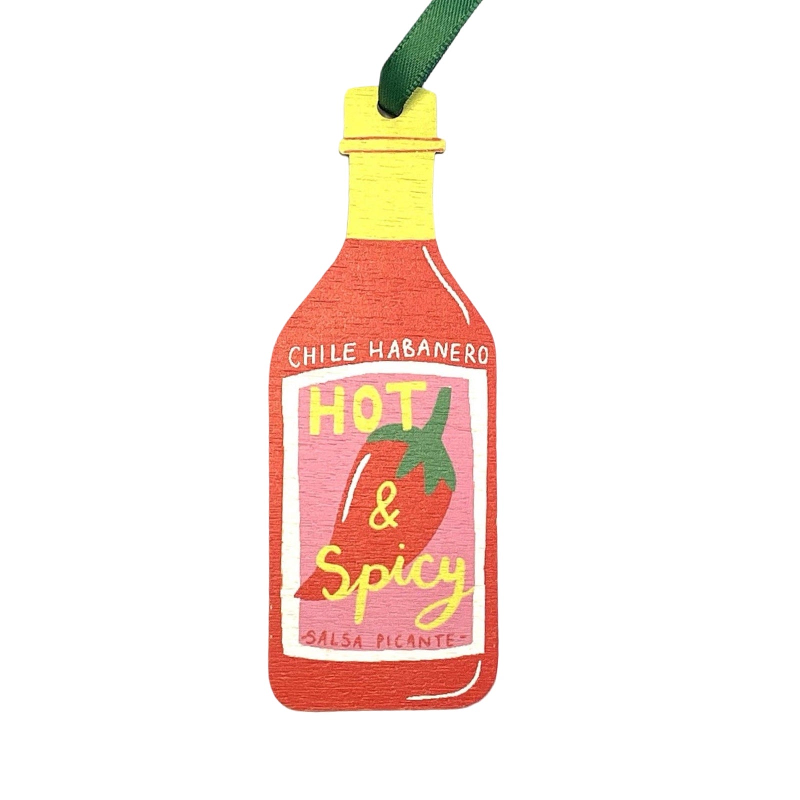 A wooden Christmas decoration of a bottle of hot sauce. 