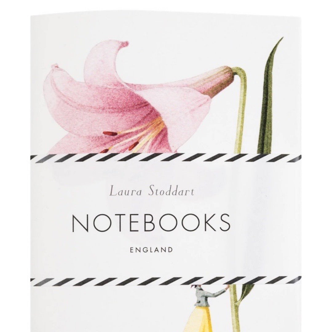 Notebook cover with pink flower illustration and 'Laura Stoddart' branding.