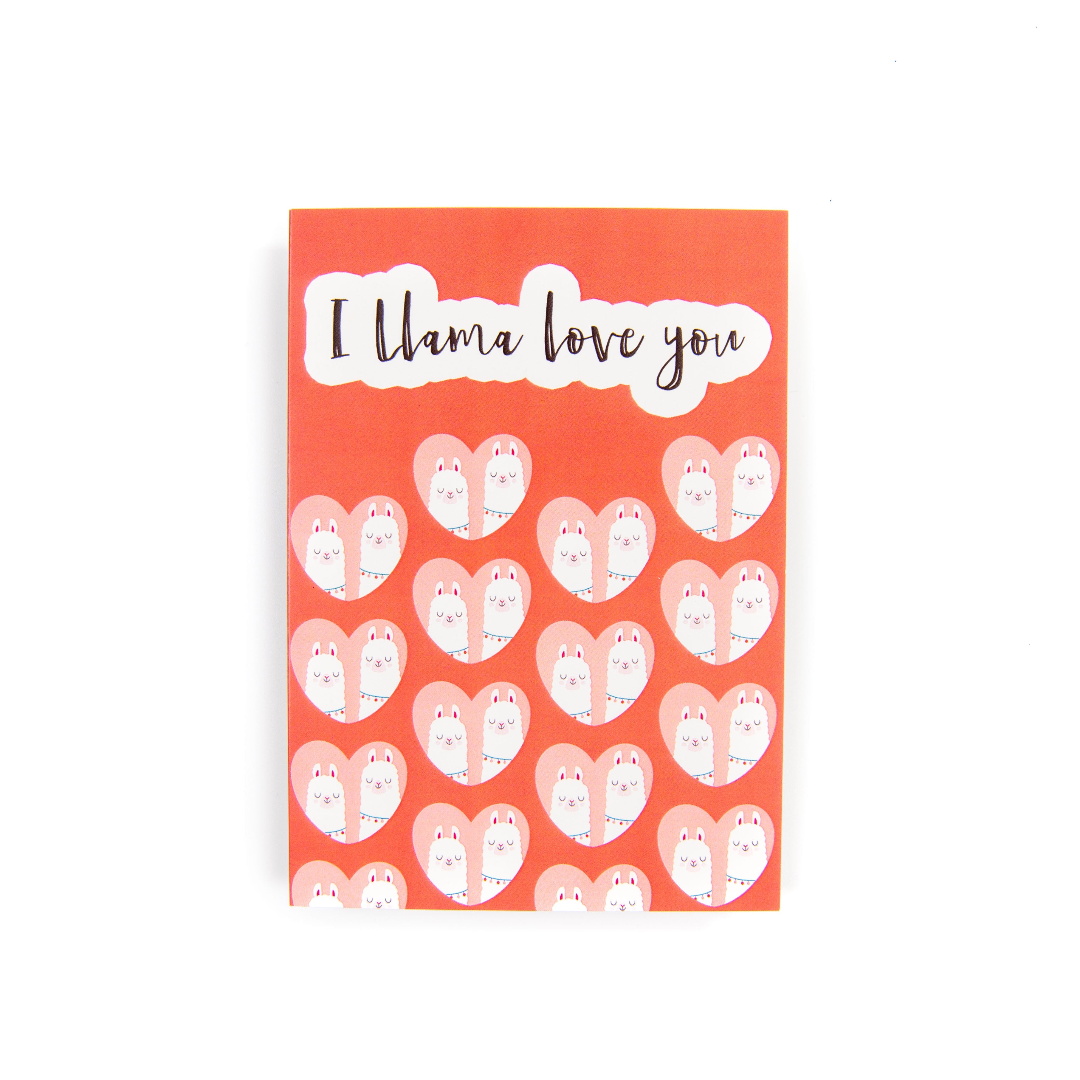 A greeting card with a red background featuring white hearts and the text 'I llama love you' in a handwritten style font.