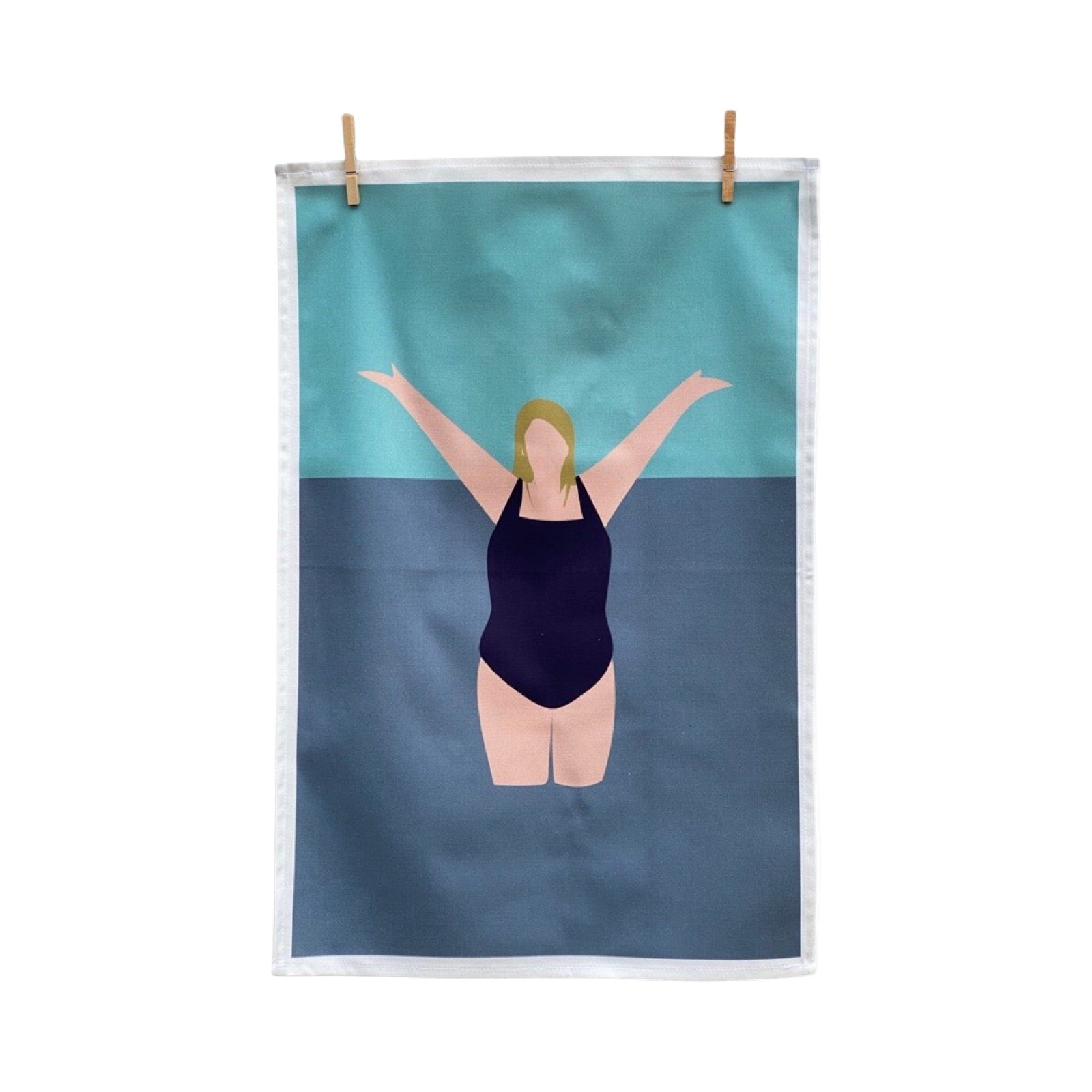 Tea towel featuring a female wild swimmer wearing a black swimsuit standing knee-deep in the water with her arms stretched out above her.