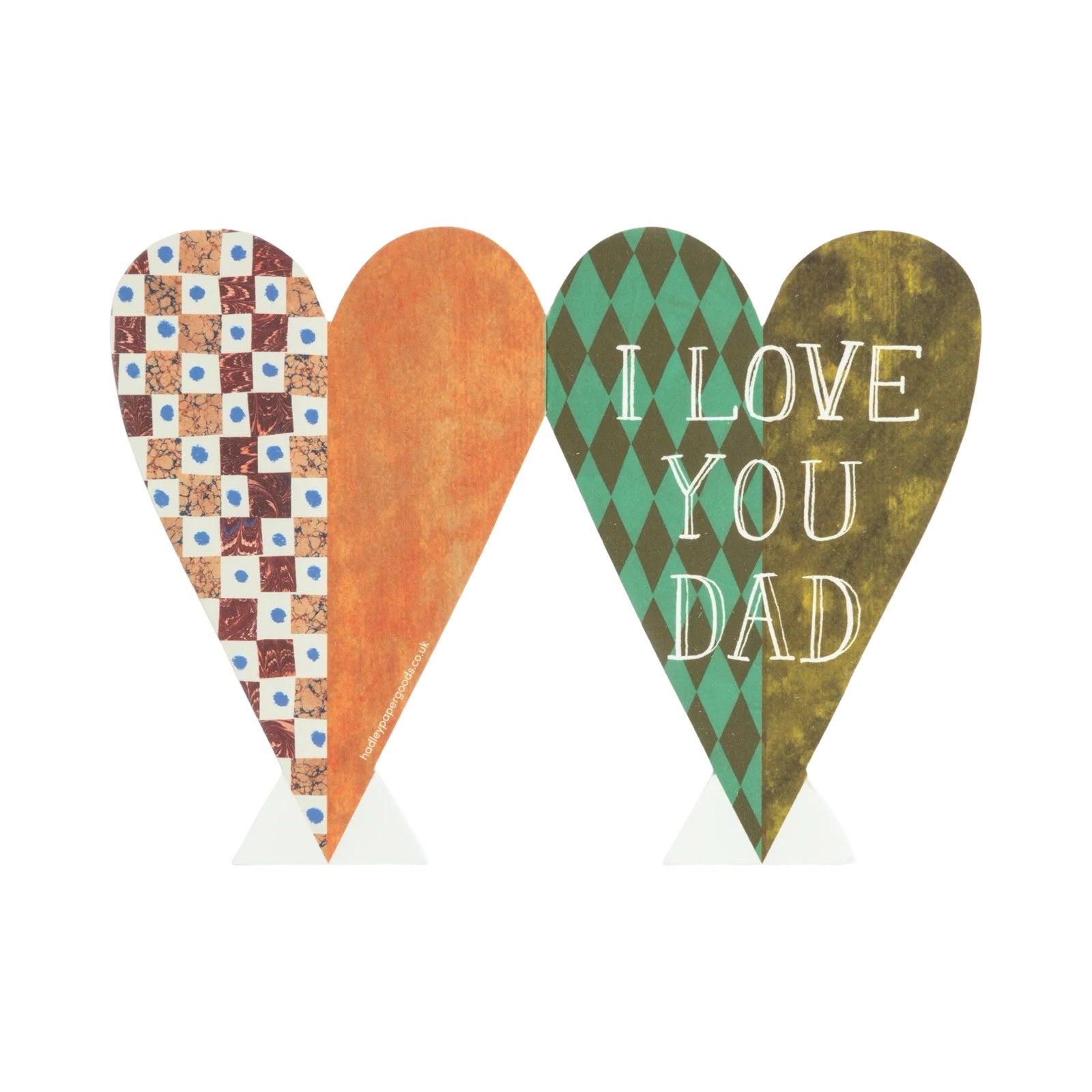 A love heart-shaped card with a green and grey checked pattern on one side and a painted green pattern on the other with the text 'I LOVE YOU DAD' written in the centre in gold lettering