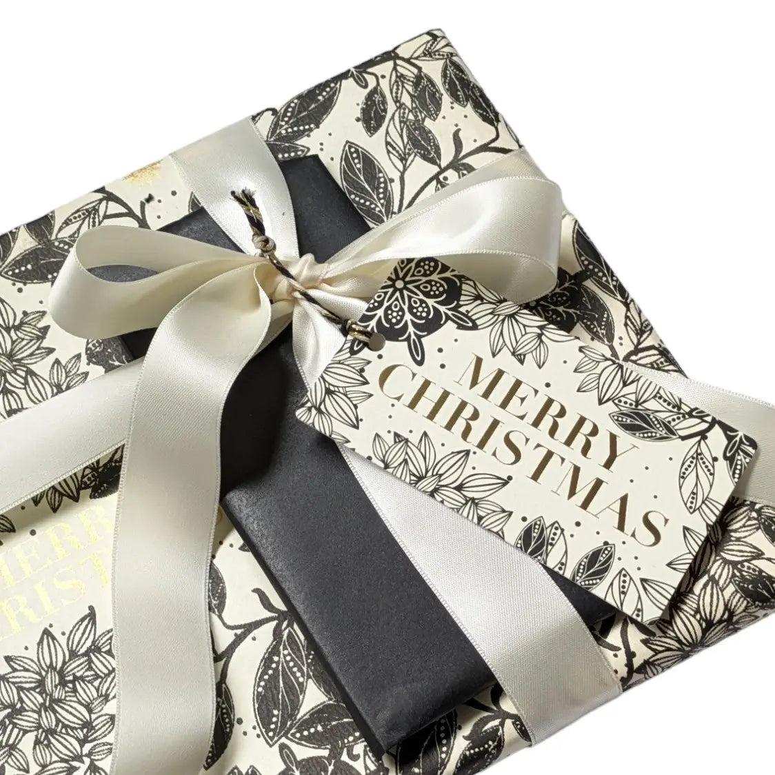 Ivory double-faced satin silk ribbon on present.